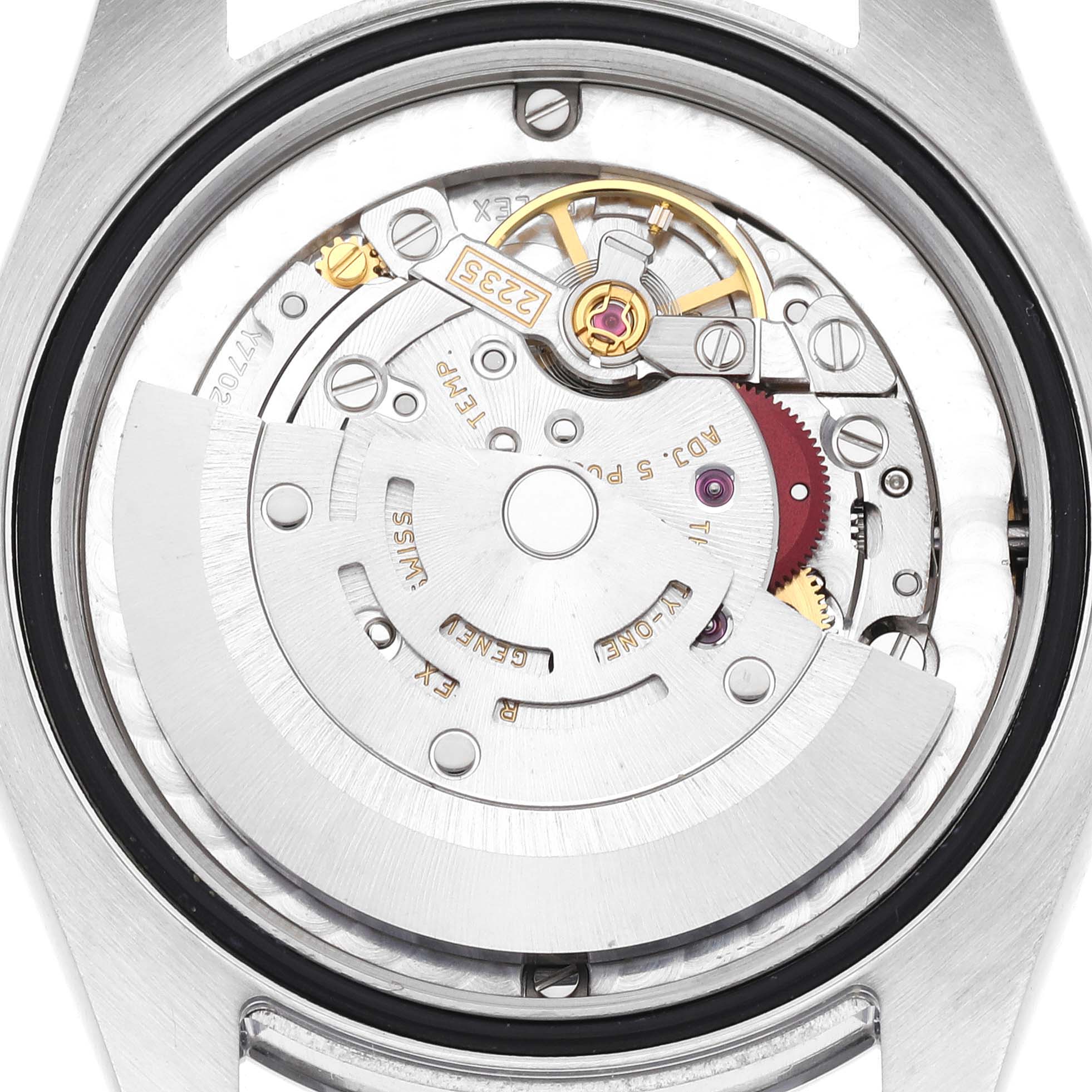 This image shows the internal mechanism, specifically the rotor and movement assembly, of a Mid-Size Rolex watch viewed from the back.