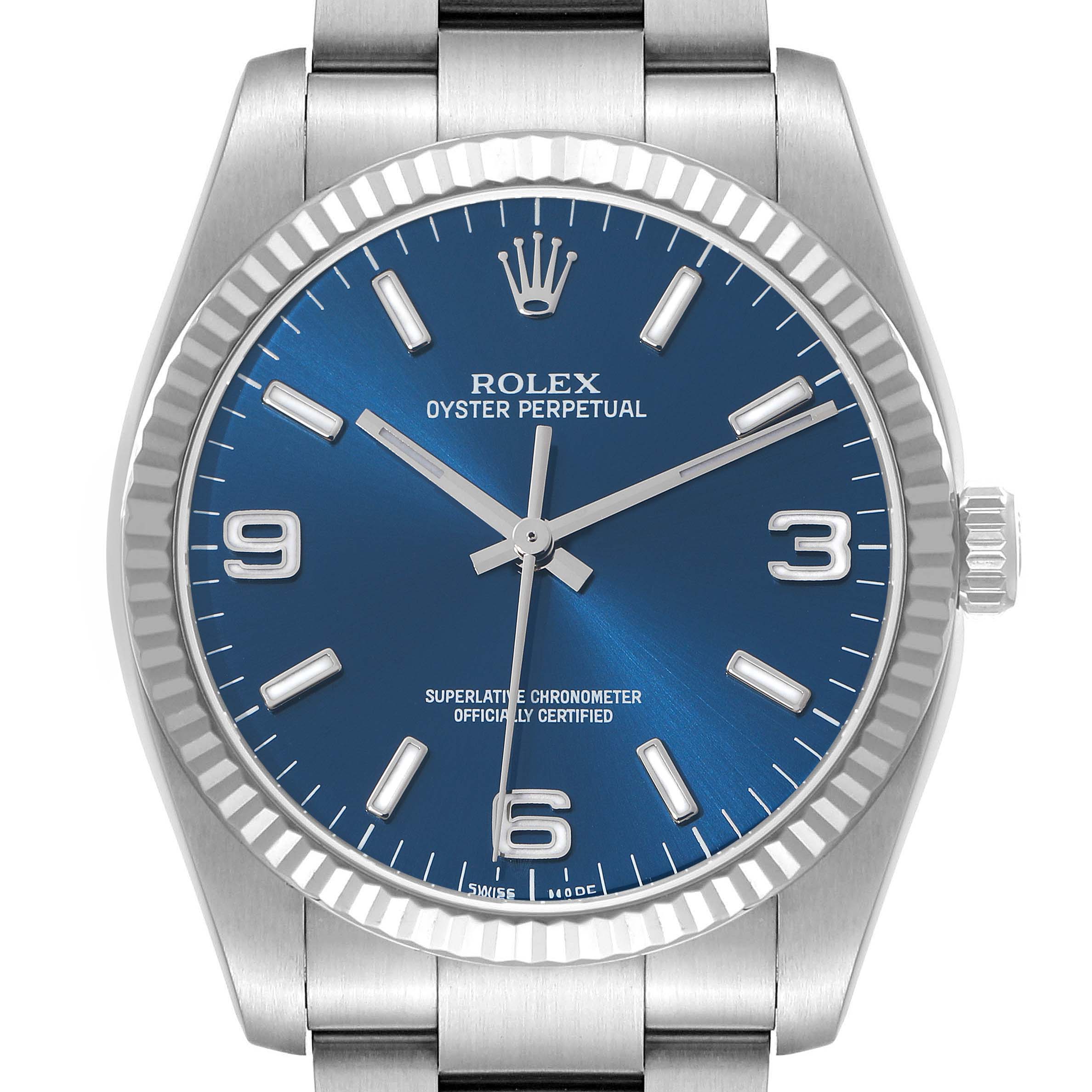 The Rolex Oyster Perpetual 116034 Men's Stainless Steel Blue Dial watch is shown from the front, displaying the blue dial, bezel, crown, and part of the bracelet.