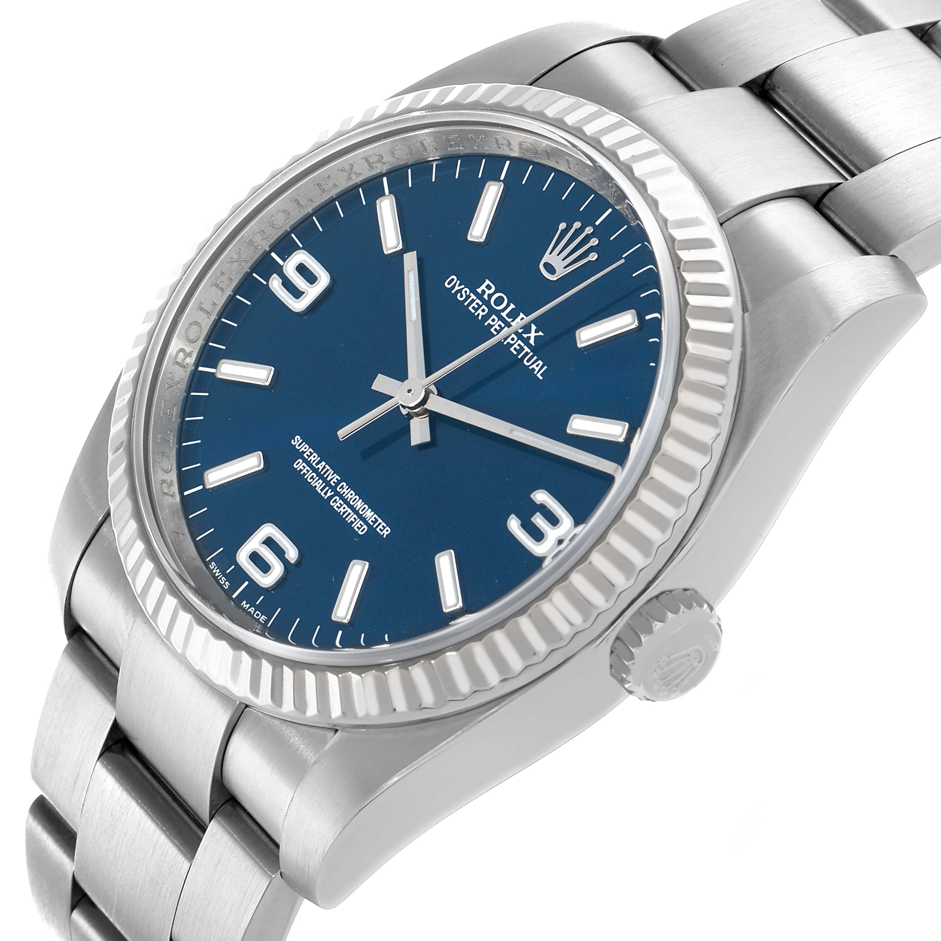 The Rolex Oyster Perpetual 116034 Men's Stainless Steel Blue Dial watch is shown from a three-quarter angle, highlighting the dial, bezel, case, crown, and bracelet.