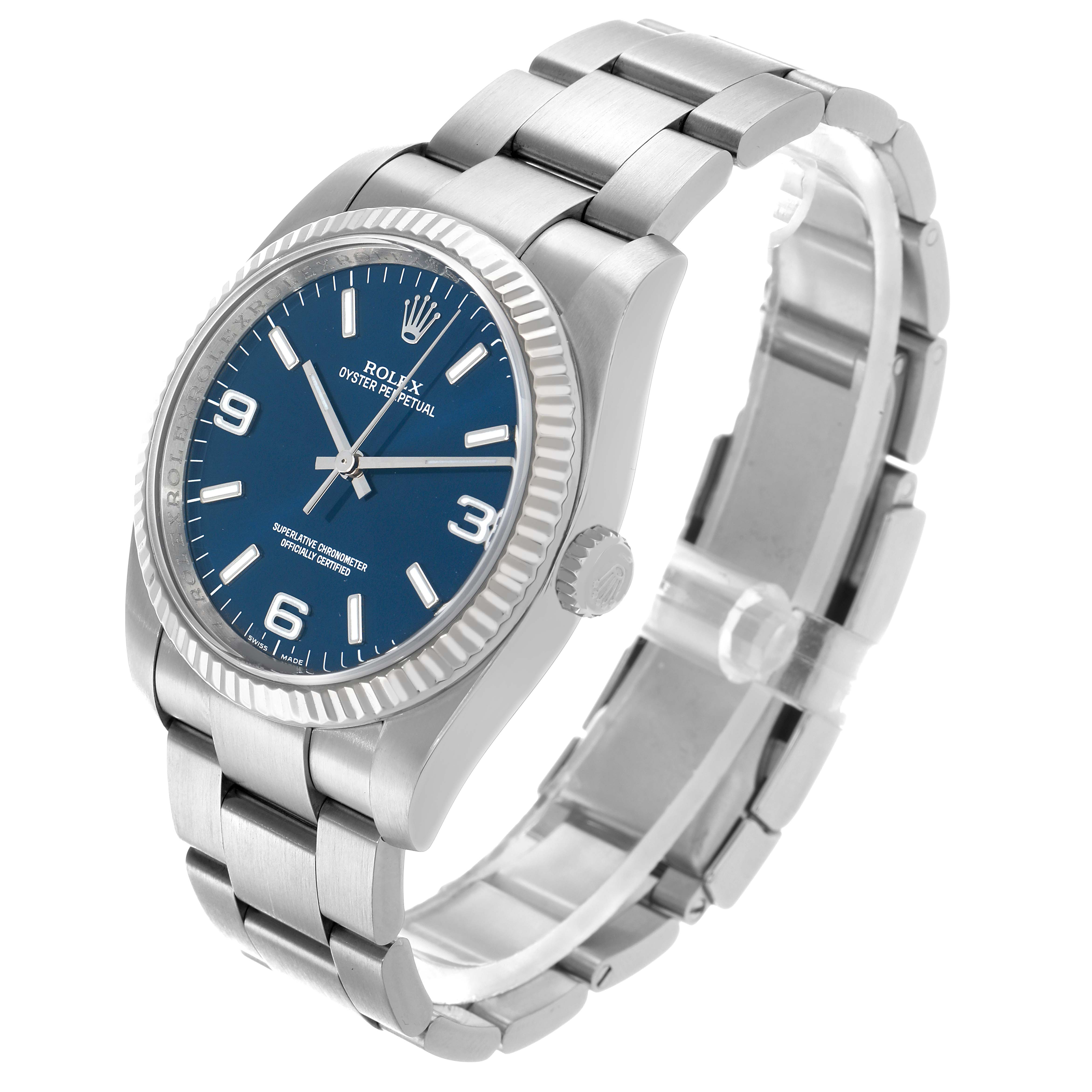 The Rolex Oyster Perpetual 116034 Men's Stainless Steel Blue Dial watch is shown at a three-quarter angle, displaying the blue dial, bezel, and bracelet.
