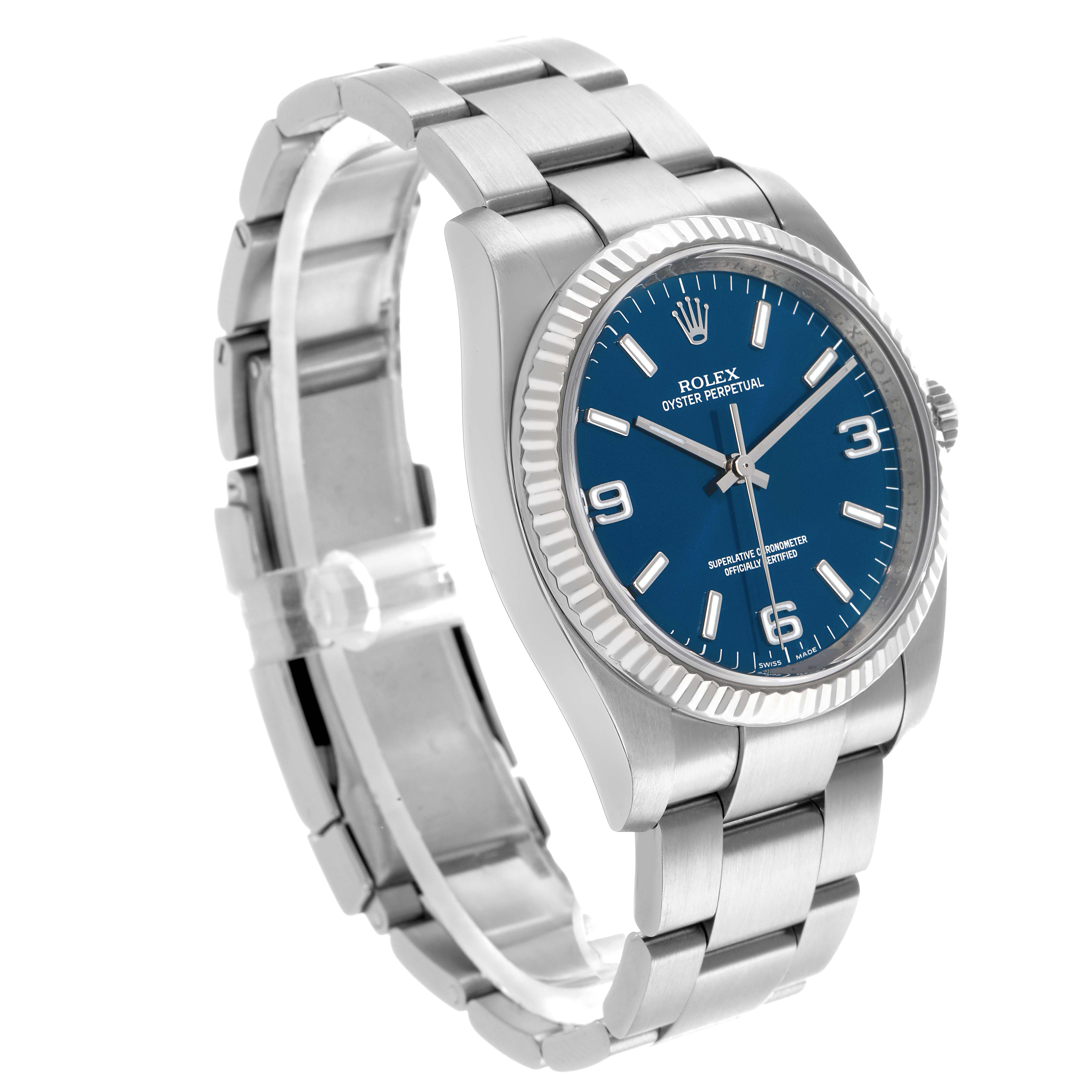The Rolex Oyster Perpetual 116034 Men's Stainless Steel Blue Dial watch is shown at an angle displaying the face, bezel, crown, and part of the bracelet.