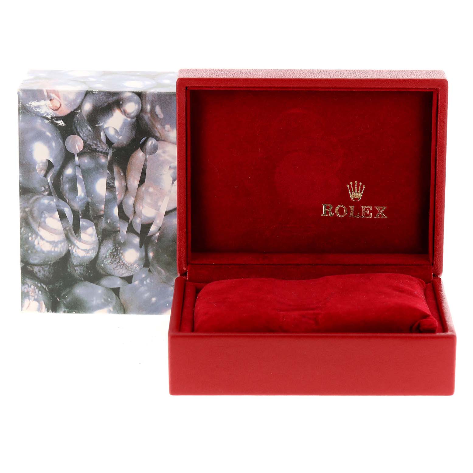 The image shows an open red Rolex box for an Oyster Perpetual watch, displaying the brand logo inside.