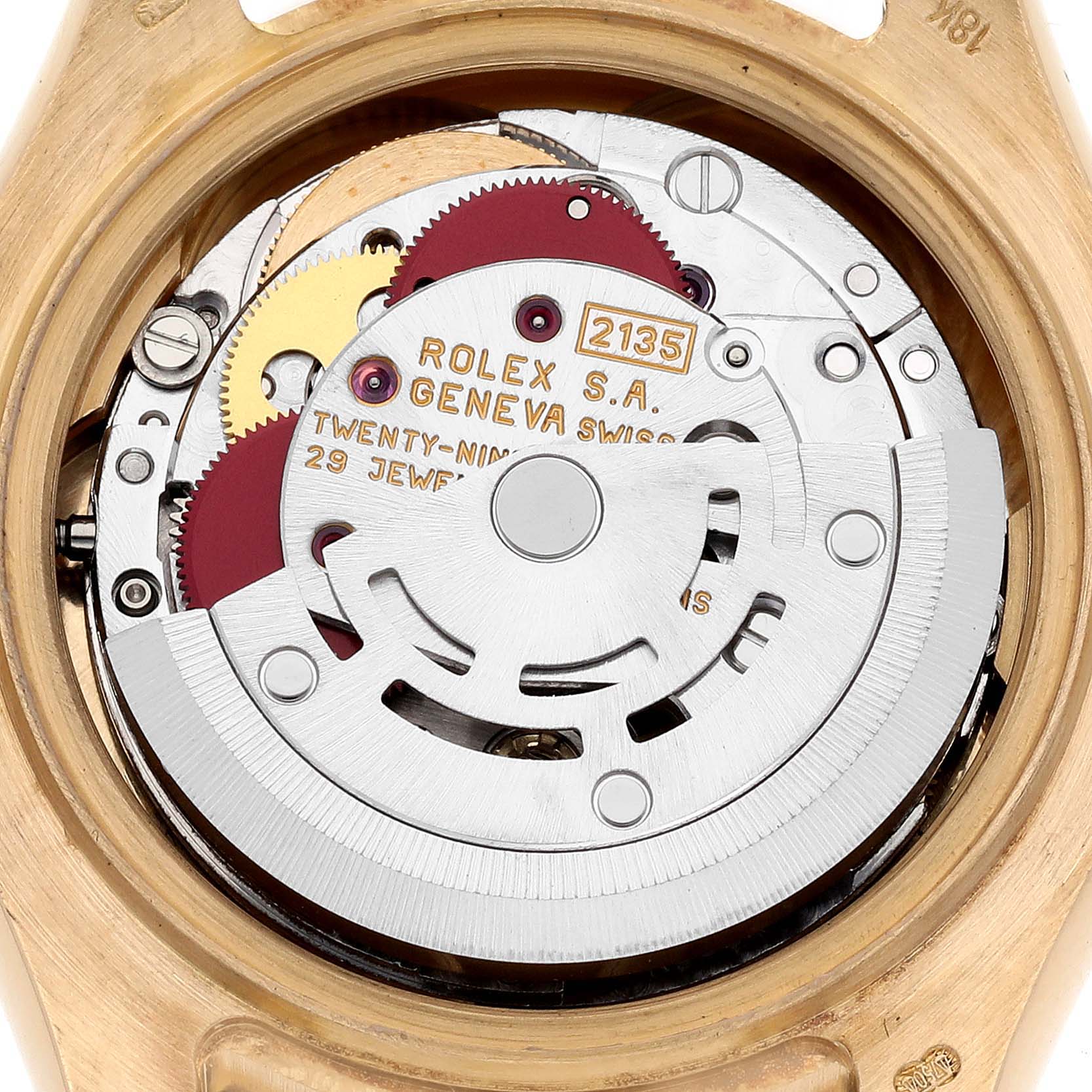 This image shows the back view of a Rolex Pearlmaster 69298 Women's Yellow Gold Champagne Dial 69298 Women's Yellow Gold Champagne Dial watch, highlighting its intricate internal movement components.