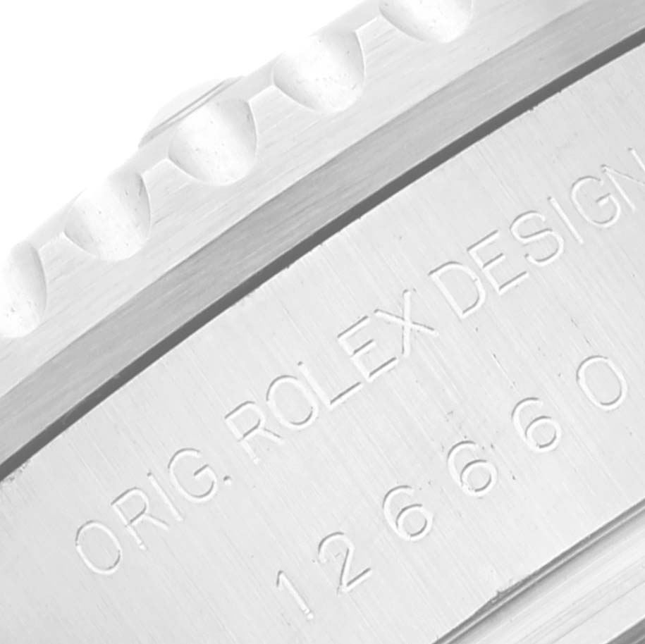 This close-up image shows the engraved side case of a Rolex Sea-Dweller 126660 Men
s Stainless Steel Black Dial 126660 Men
s Stainless Steel Black Dial watch, detailing its model number.