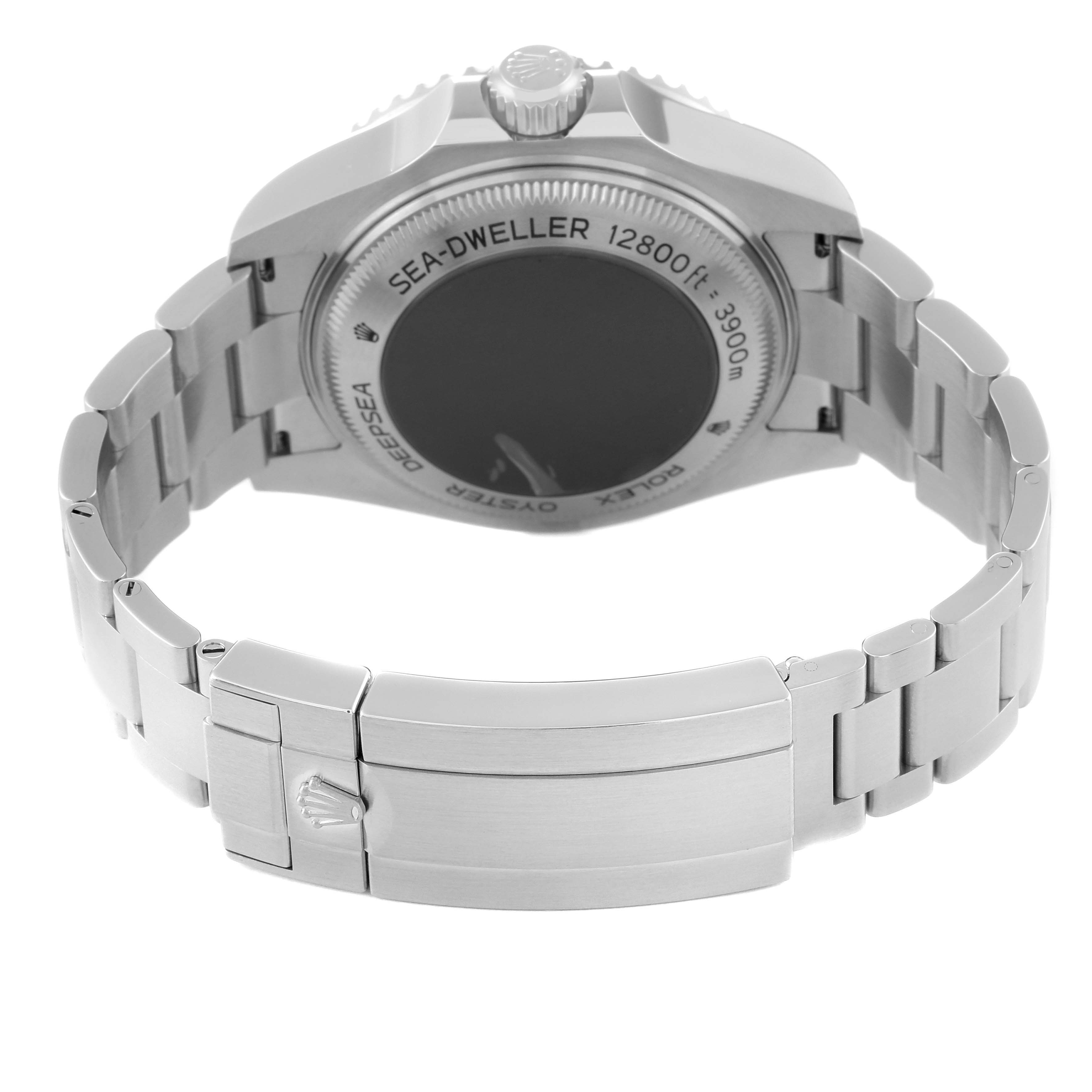 The image shows the back view of the Rolex Sea-Dweller 126660 Men
s Stainless Steel Black Dial 126660 Men
s Stainless Steel Black Dial watch, highlighting the case back, bracelet, and clasp.