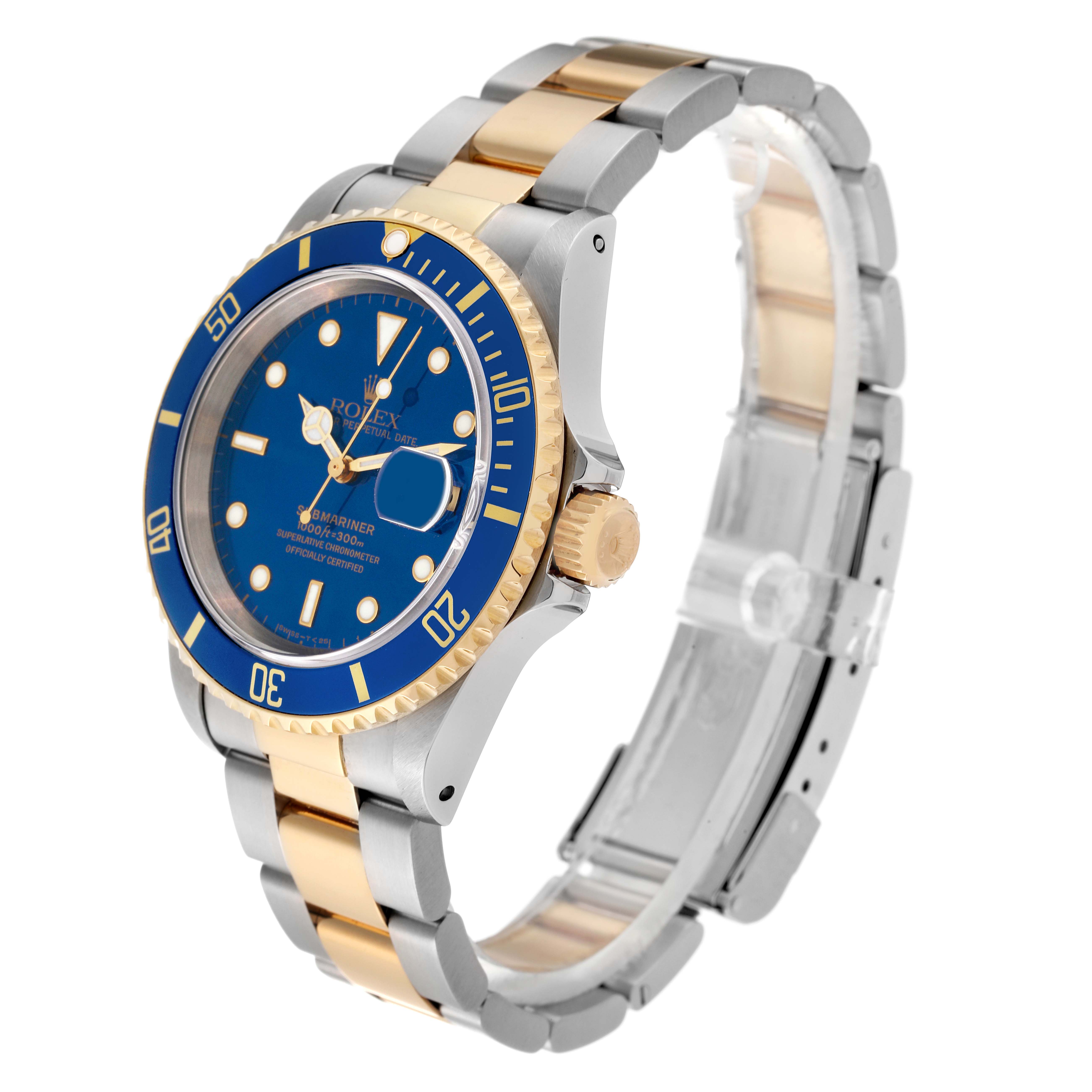 The image shows a side angle of a Rolex Submariner 16613 Men's Steel and Gold (two tone) Blue Dial 16613 Men's Steel and Gold (two tone) Blue Dial watch, highlighting its blue dial, bezel, and gold and silver bracelet.