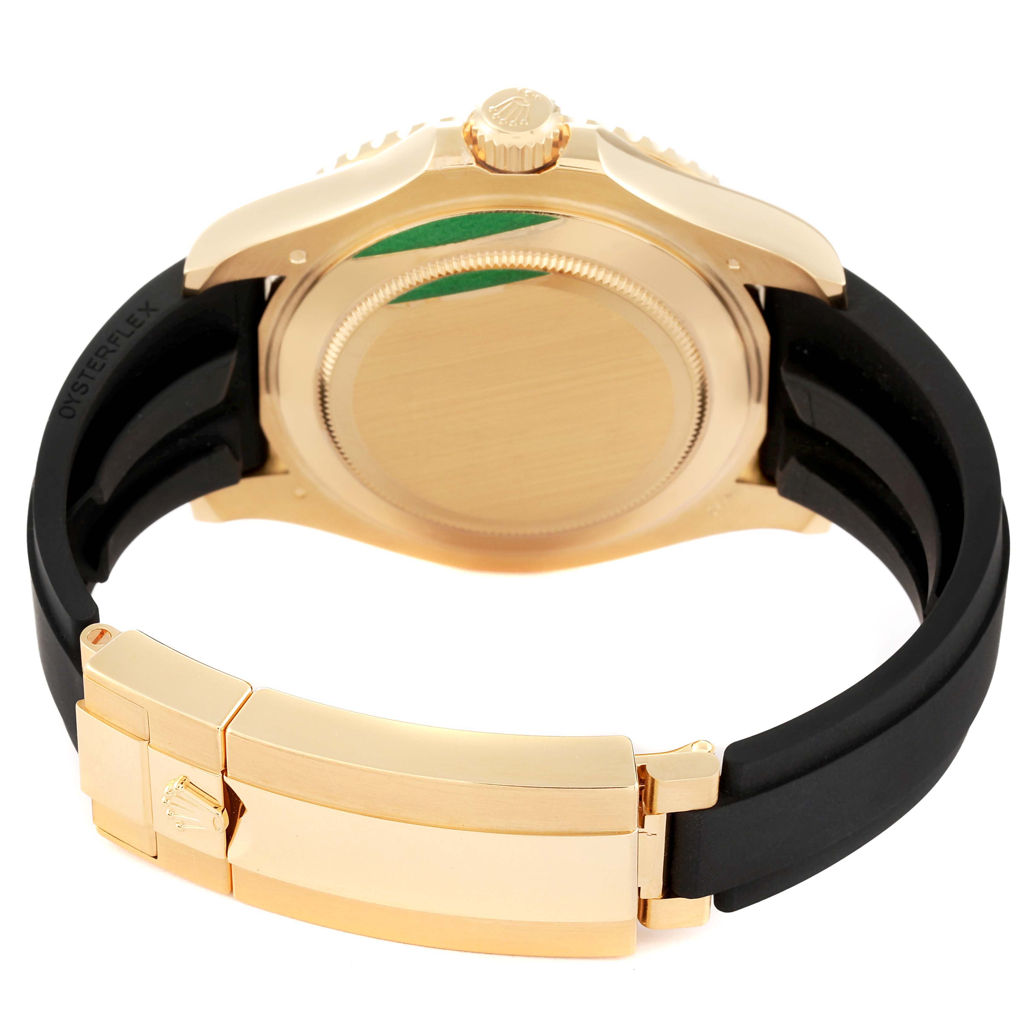 This image shows the back case and clasp of a Rolex Yacht-Master 226658 Men's Yellow Gold Black Dial 226658 Men's Yellow Gold Black Dial watch with a black Oysterflex band.
