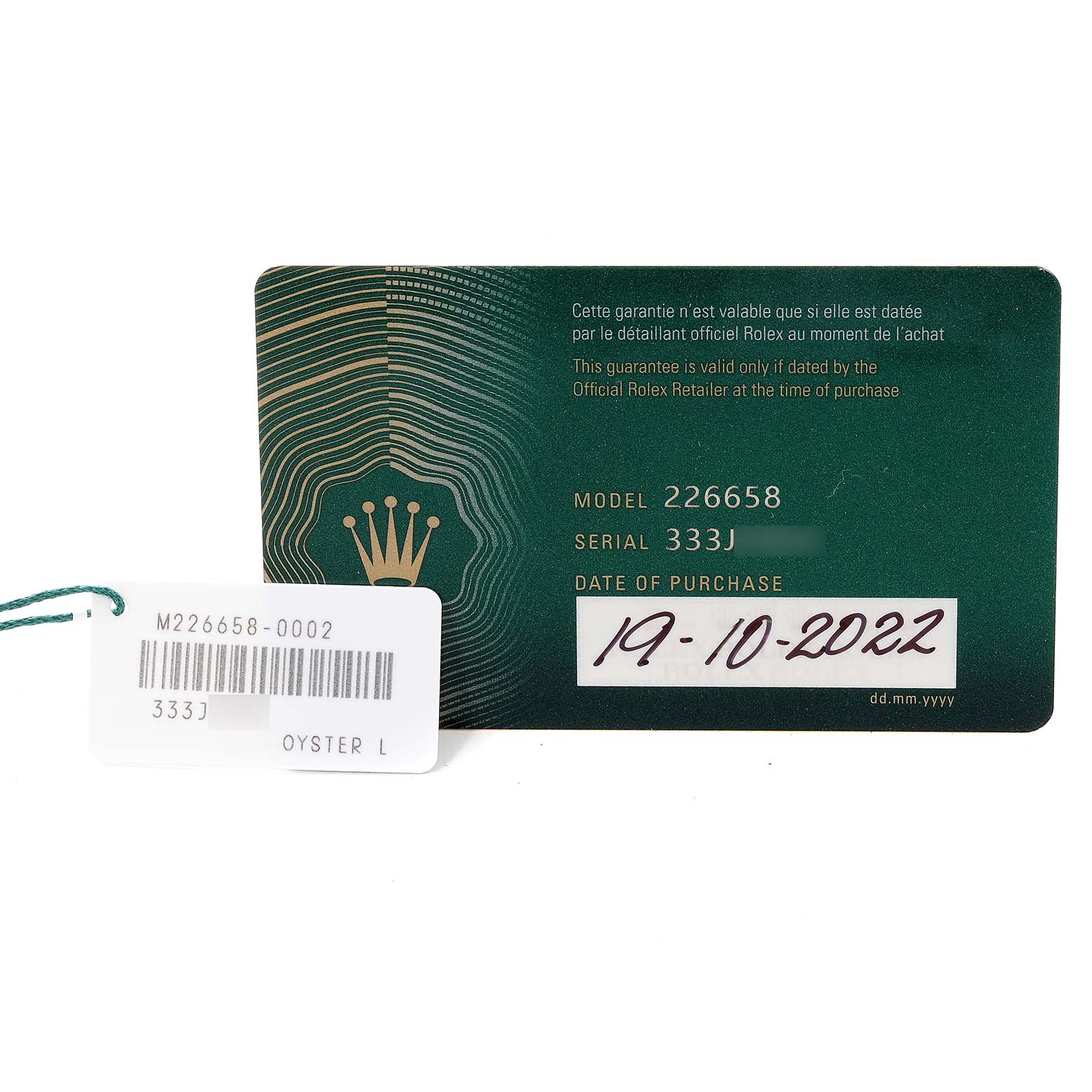 The image shows a warranty card and tag for a Rolex Yacht-Master 226658 Men's Yellow Gold Black Dial 226658 Men's Yellow Gold Black Dial model 226658.