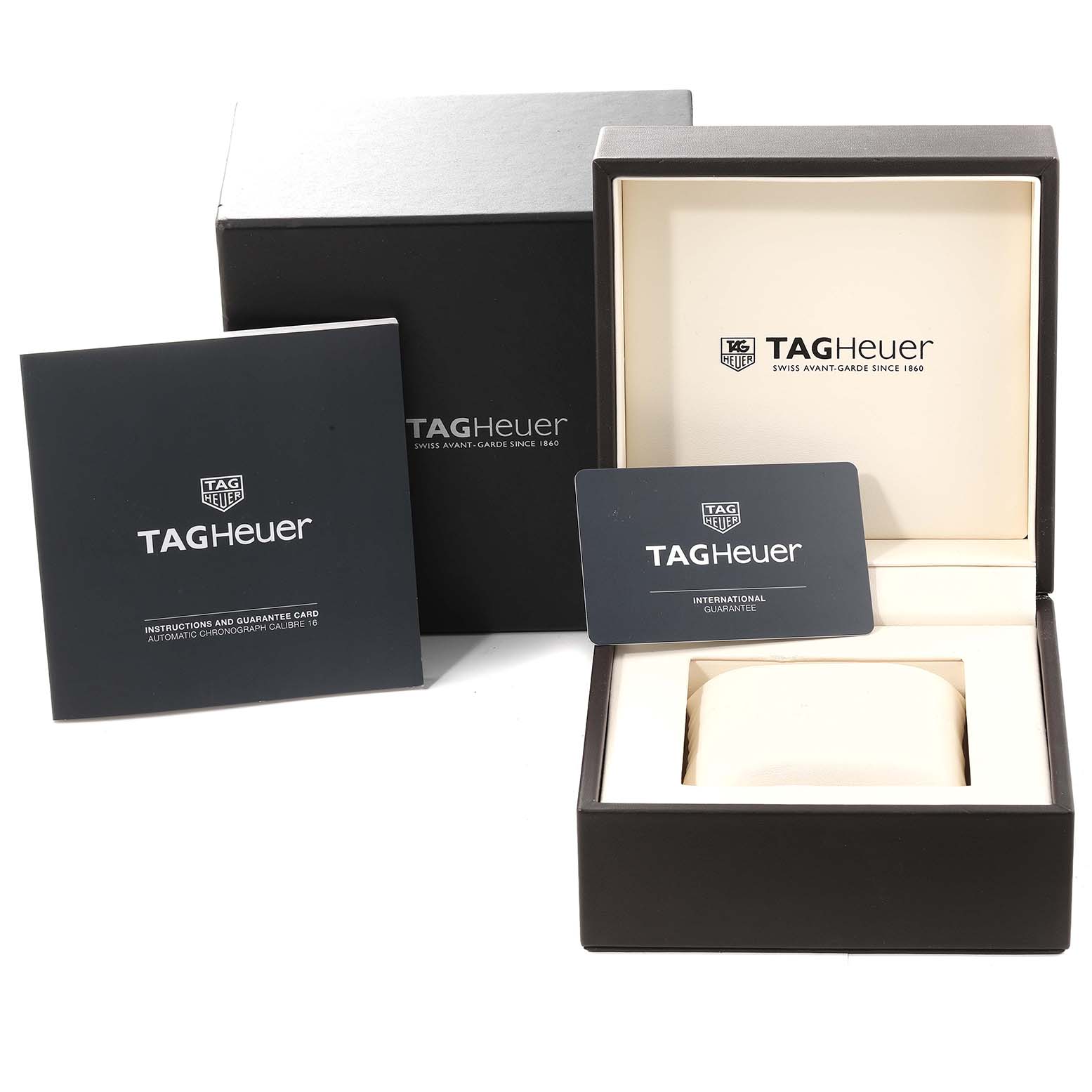 The image shows the Tag Heuer Aquaracer CAY211A Men's Stainless Steel Black Dial CAY211A Men's Stainless Steel Black Dial box with an open lid, instruction manual, and international guarantee card.