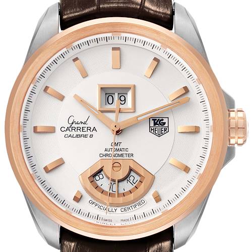 The image shows the dial and bezel of a Tag Heuer Carrera watch, highlighting the date, GMT display, and chronometer certification.