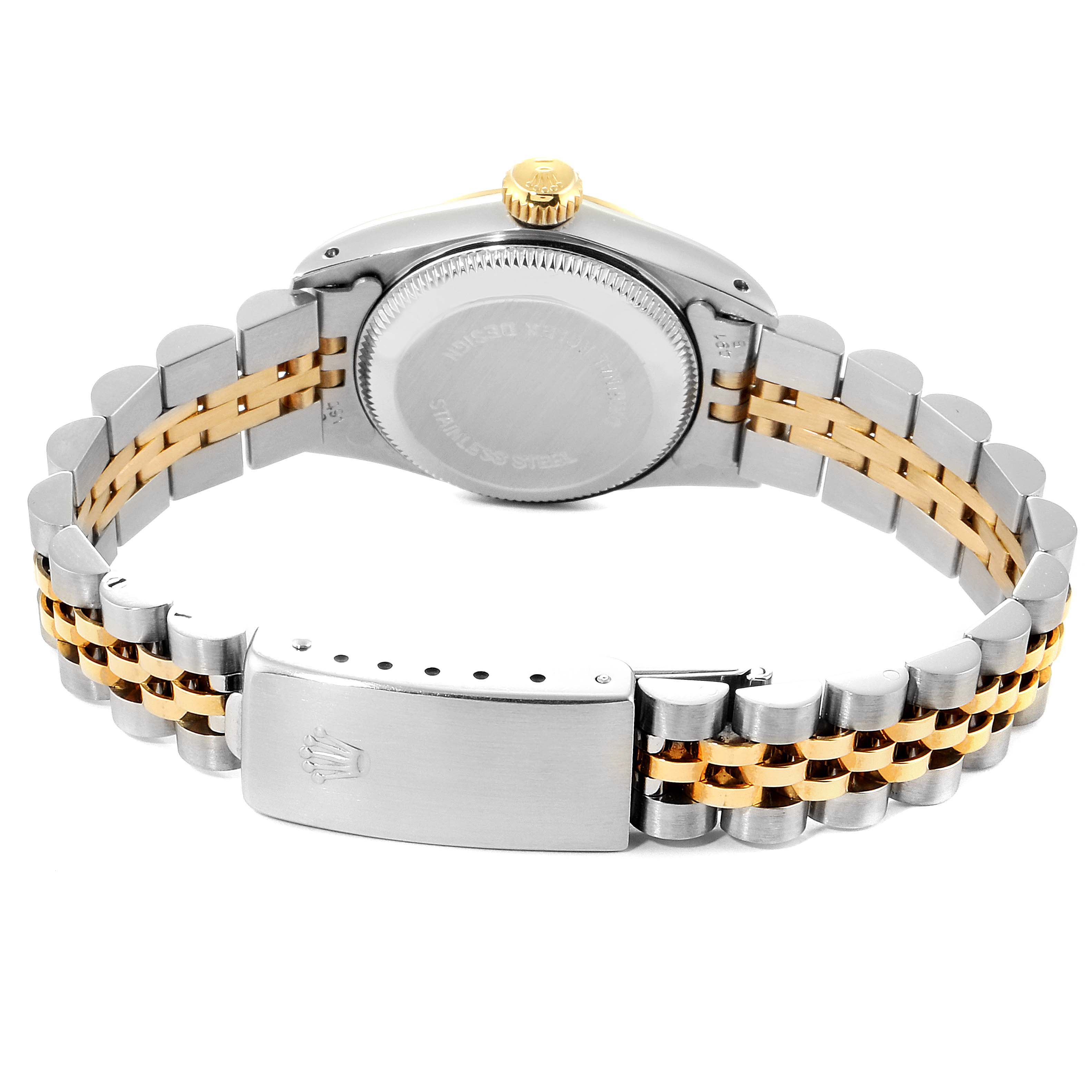 This image shows the back view of a Rolex Datejust 67193 Women
s Steel and Gold (two tone) White Dial 67193 Women
s Steel and Gold (two tone) White Dial watch, highlighting the casing and the two-tone metal bracelet with the clasp.