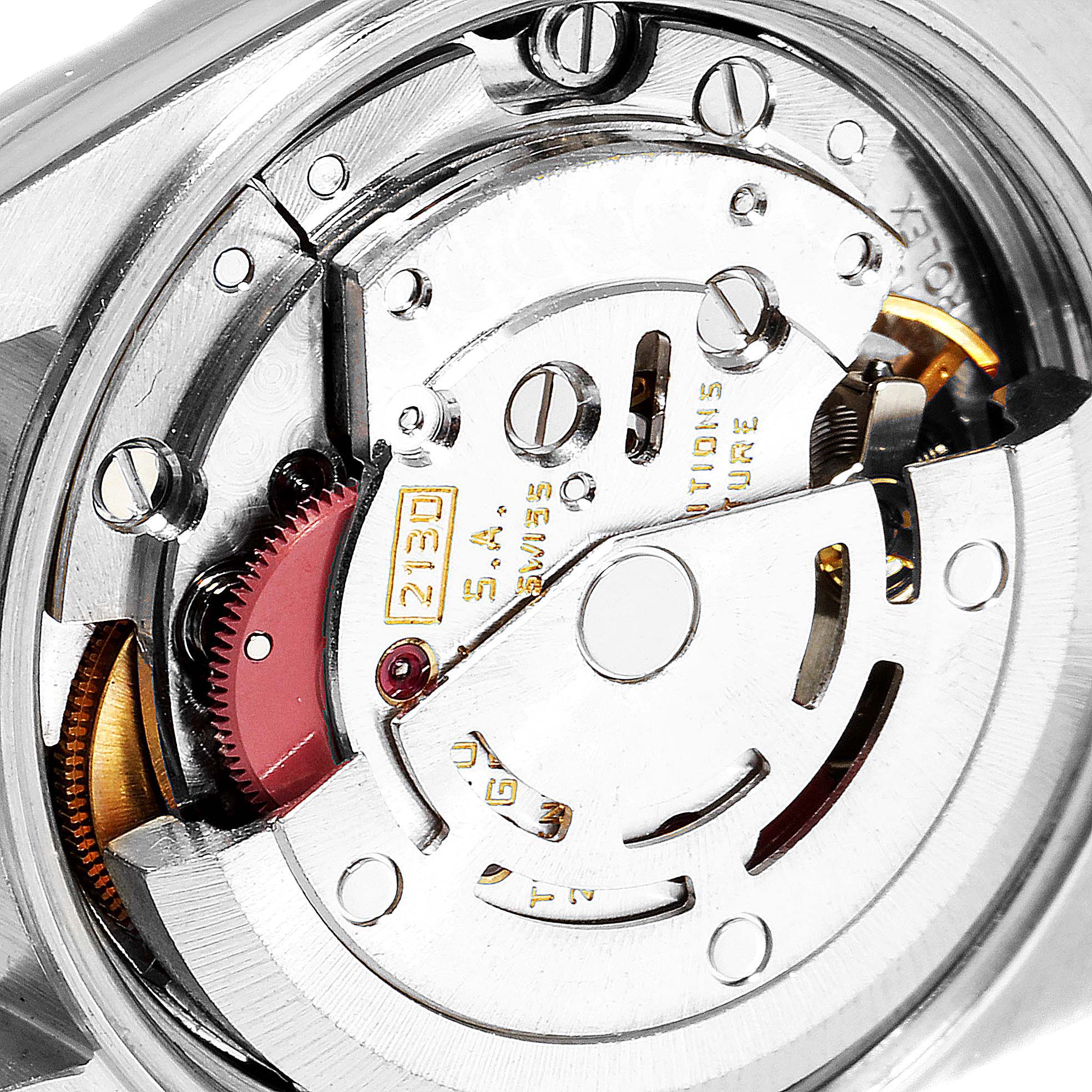 This image shows the inner mechanical components of a Rolex Datejust 67193 Women
s Steel and Gold (two tone) White Dial 67193 Women
s Steel and Gold (two tone) White Dial watch from an angled, close-up view.