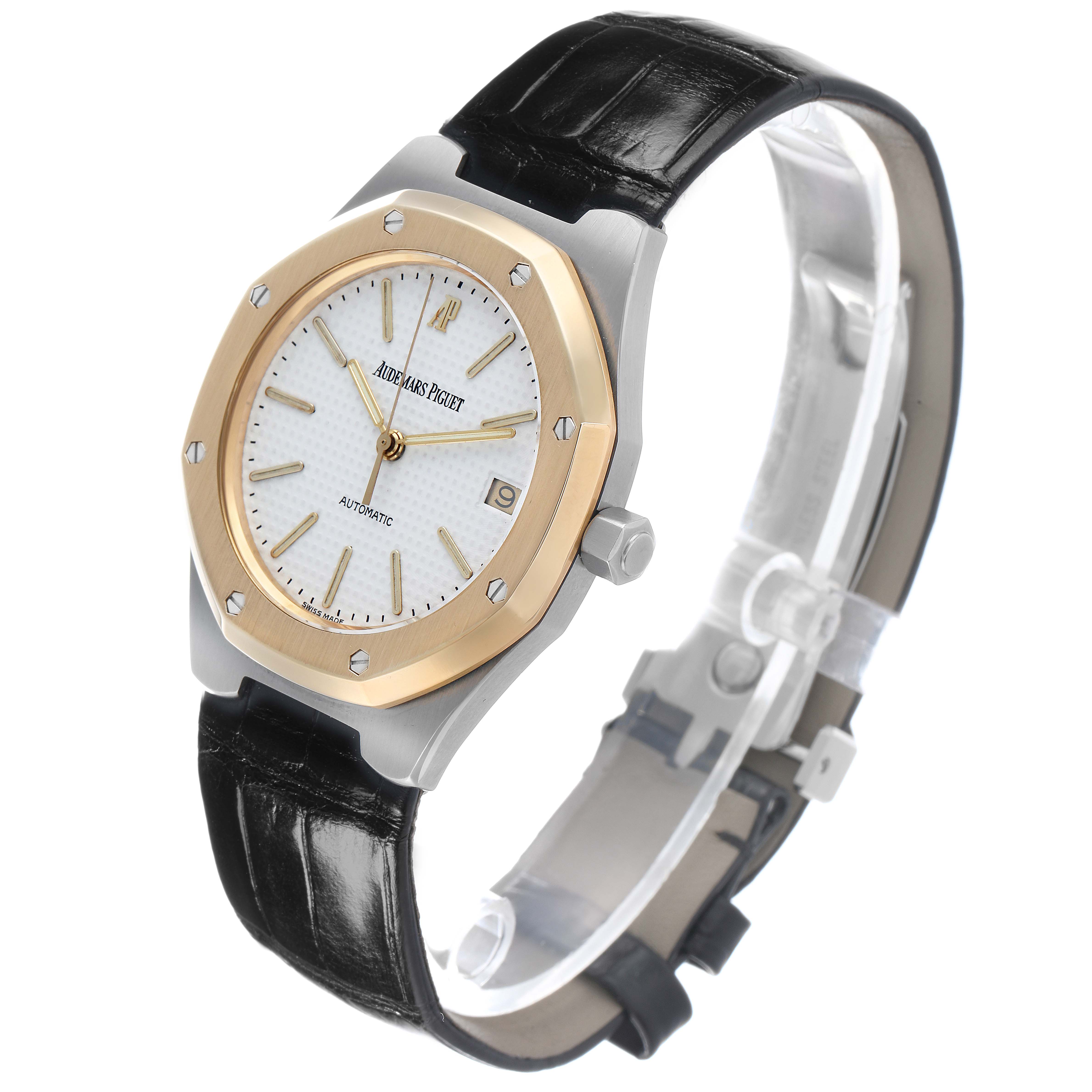 The Audemars Piguet Royal Oak 14800SA Men's Stainless Steel White Dial watch is shown from a tilted angle, highlighting its face, bezel, and leather strap.