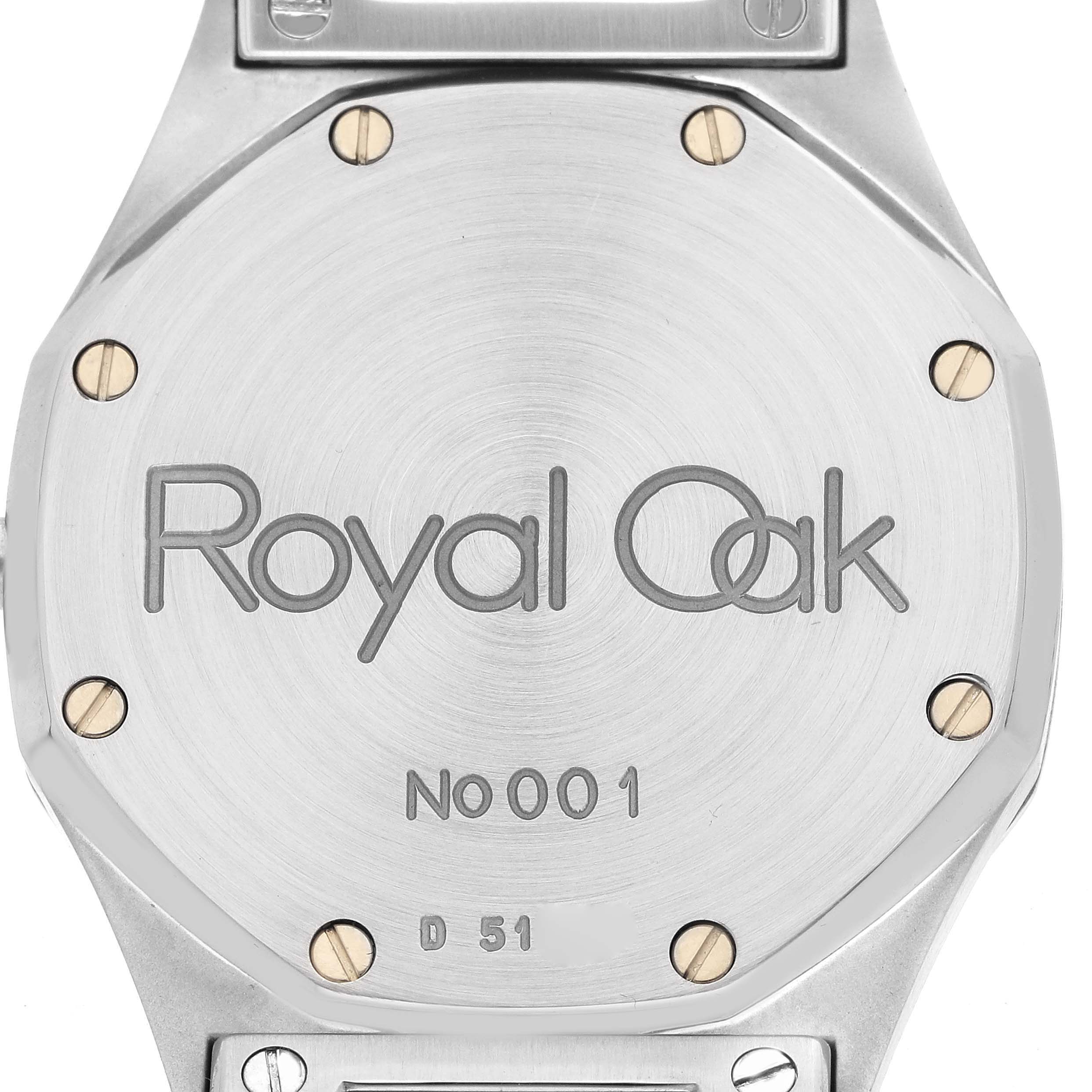 The image shows the back case of an Audemars Piguet Royal Oak 14800SA Men's Stainless Steel White Dial watch, featuring its logo and screws.