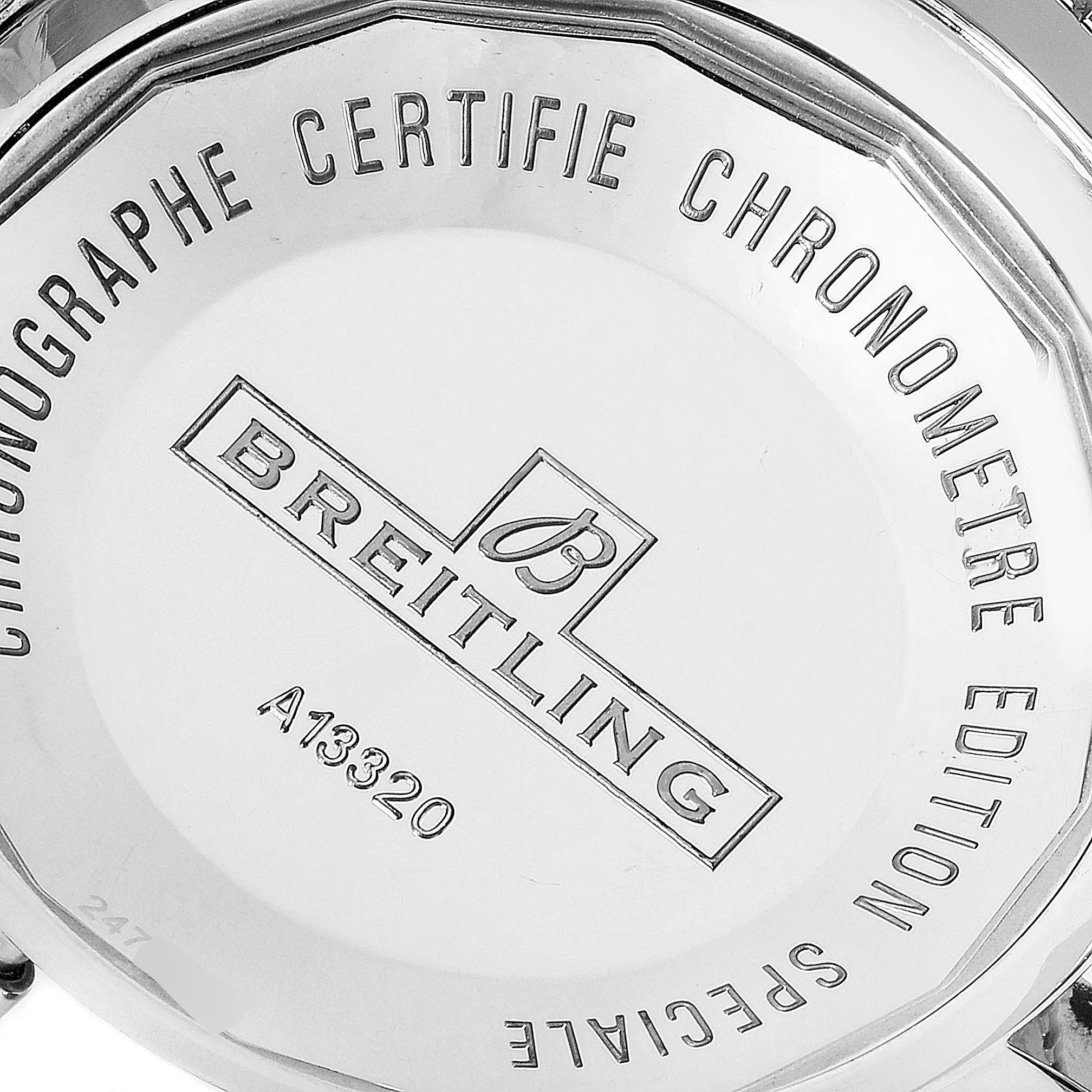 This image shows the case back of a Breitling Superocean A13320 Men's Stainless Steel Black Dial A13320 Men's Stainless Steel Black Dial watch, displaying engraved details and the model number.