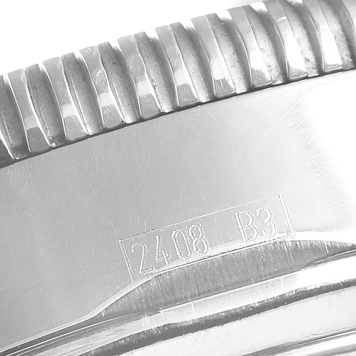 The image shows a close-up of the bezel and case engraving "2408 B3" on the Breitling Superocean A13320 Men's Stainless Steel Black Dial A13320 Men's Stainless Steel Black Dial watch.