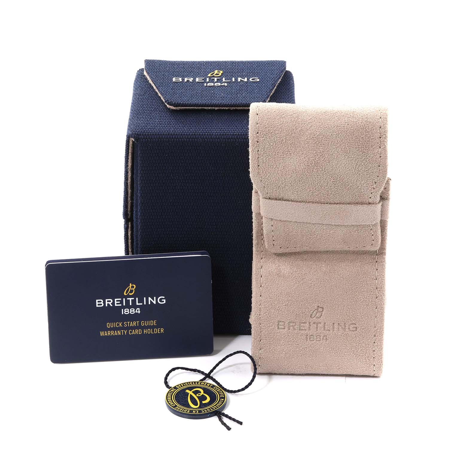 The image shows the accessory package for a Breitling Superocean AB2010 Men
s Stainless Steel Black Dial AB2010 Men
s Stainless Steel Black Dial watch, including a box, pouch, quick start guide, and tag.