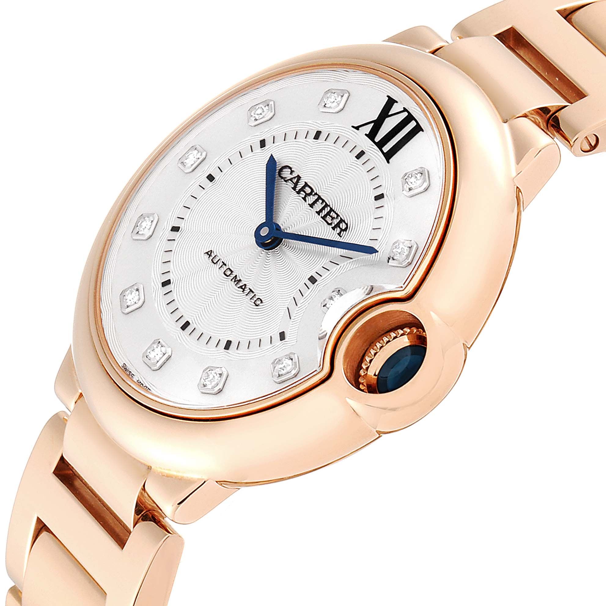 The image shows a close-up view of the dial and crown of a Cartier Ballon Bleu WE902026 Women's Rose Gold Silver Dial WE902026 Women's Rose Gold Silver Dial watch, highlighting its rose gold casing and blue hands.