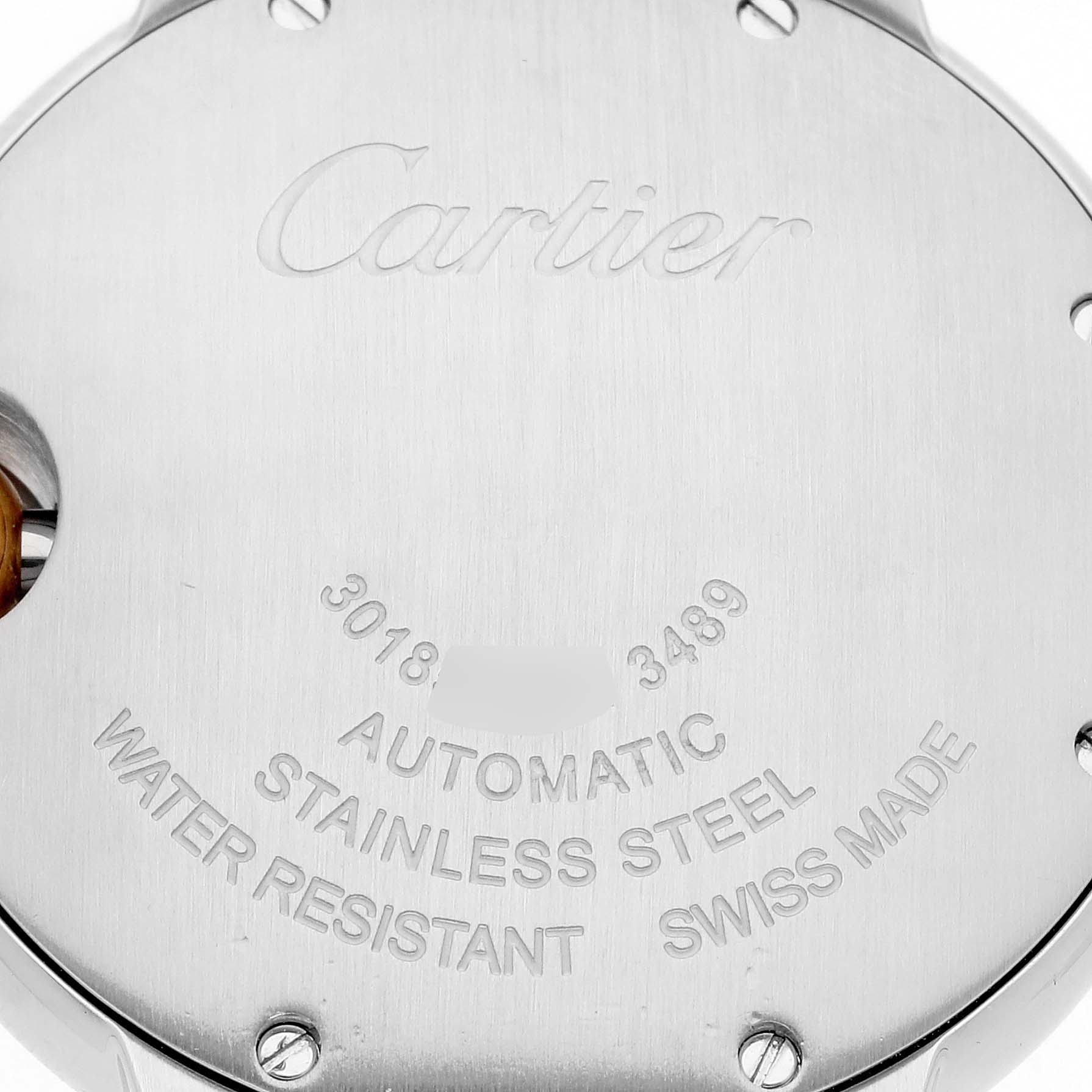 This image shows the stainless steel case back of a Ballon Bleu watch by Cartier, inscribed with brand details and specifications.
