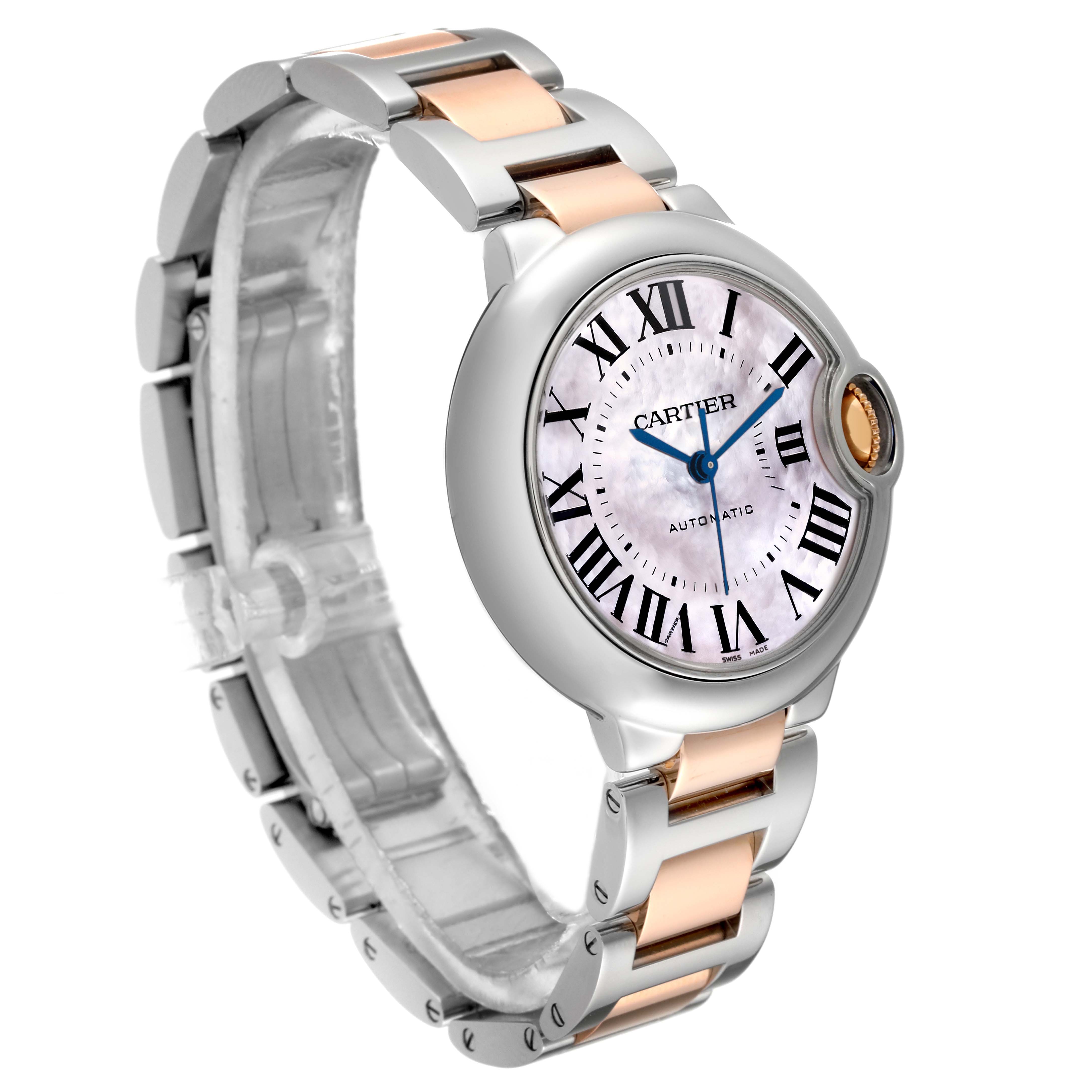The image shows the front and side angle of the Cartier Ballon Bleu W6920098 Women's Steel and Gold (two tone) Mother of Pearl Dial W6920098 Women's Steel and Gold (two tone) Mother of Pearl Dial watch, highlighting its face, crown, and two-tone bracelet.