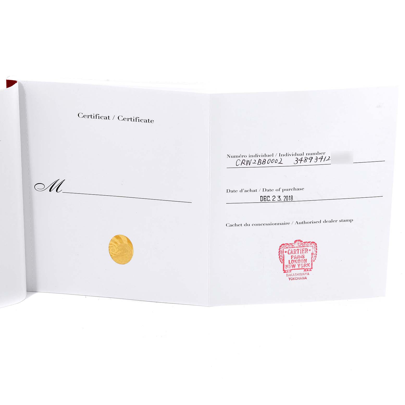 The image shows the certificate or warranty card for the Ballon Bleu model by Cartier, unfolded and displaying purchase details.
