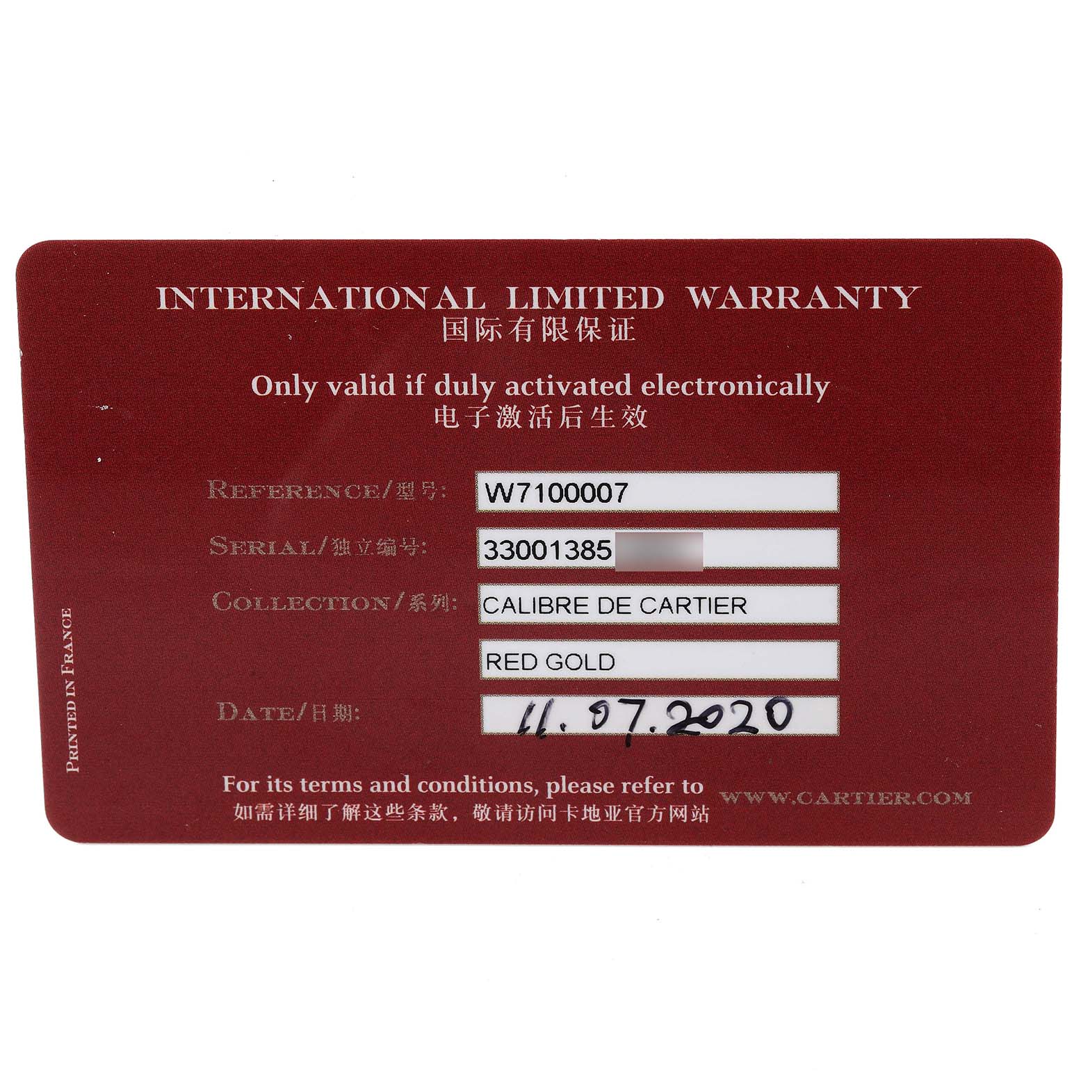 The image shows an international limited warranty card for a Calibre de Cartier model by Cartier, viewed from the front.