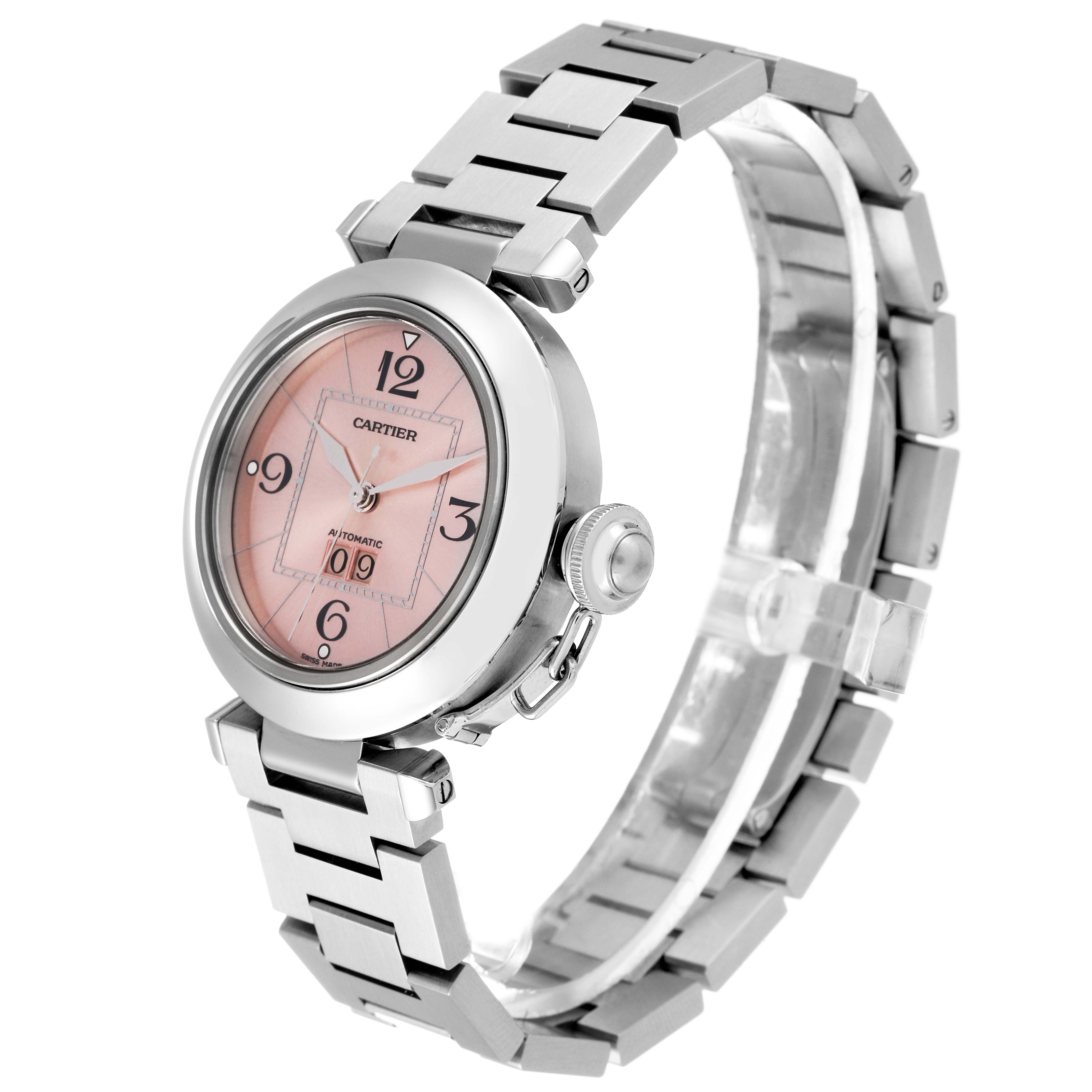 The Cartier Pasha W31058M7 Women's Stainless Steel Pink Dial W31058M7 Women's Stainless Steel Pink Dial watch is shown at an angled view highlighting the face, crown, and metal bracelet.