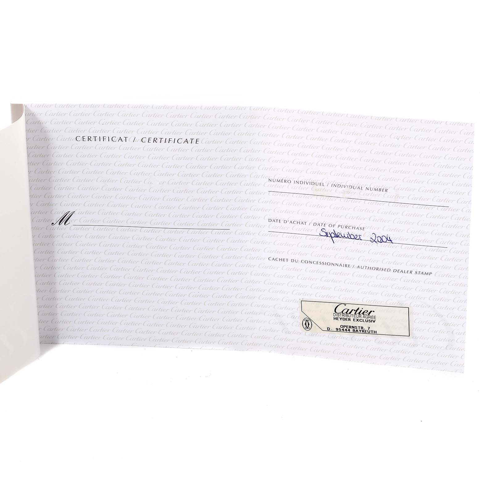 This image shows the certificate of the Pasha model watch by Cartier, with dealer stamp and purchase date visible.