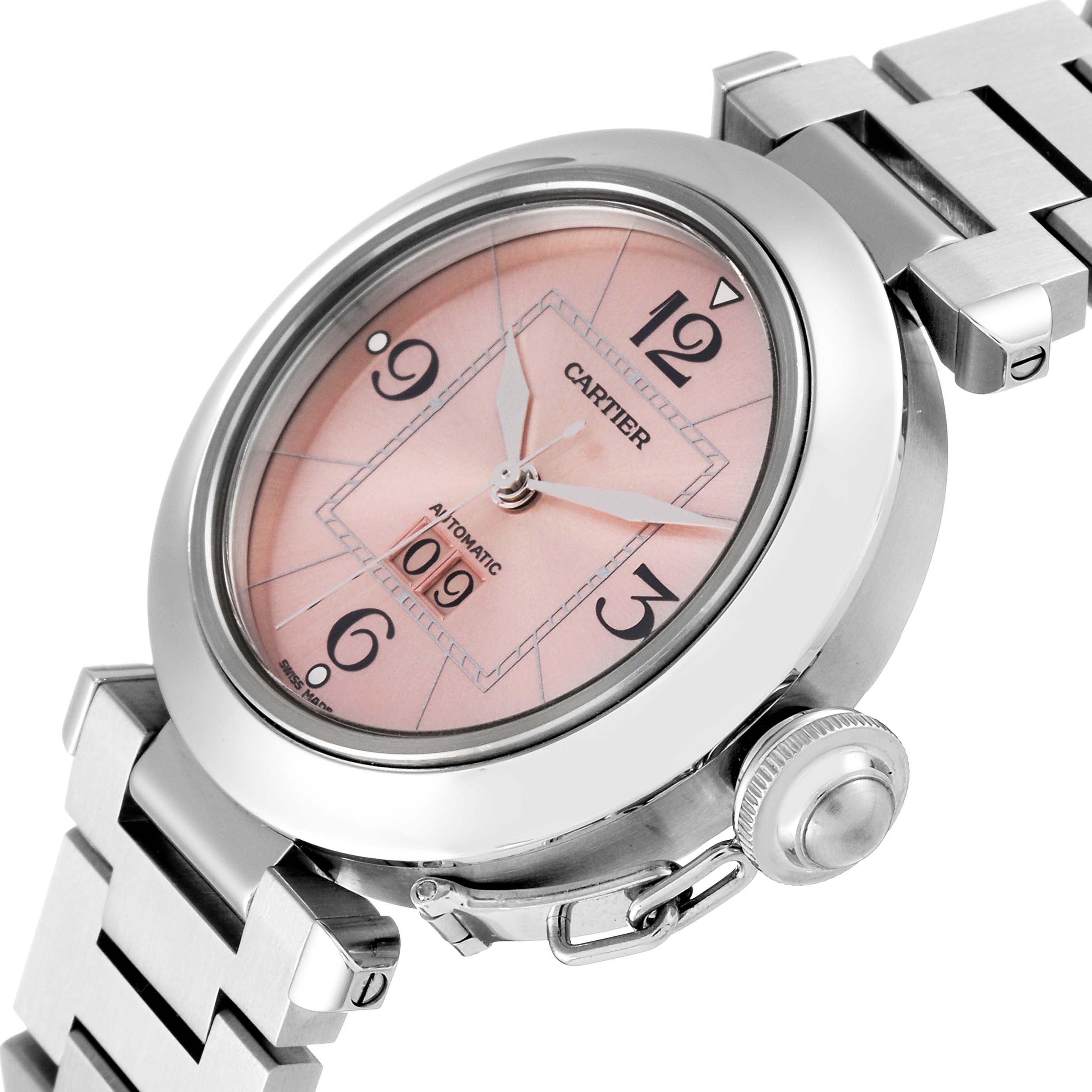 The Cartier Pasha W31058M7 Women's Stainless Steel Pink Dial W31058M7 Women's Stainless Steel Pink Dial watch is shown at a slight angle, displaying the dial, bezel, crown, and part of the stainless steel bracelet.