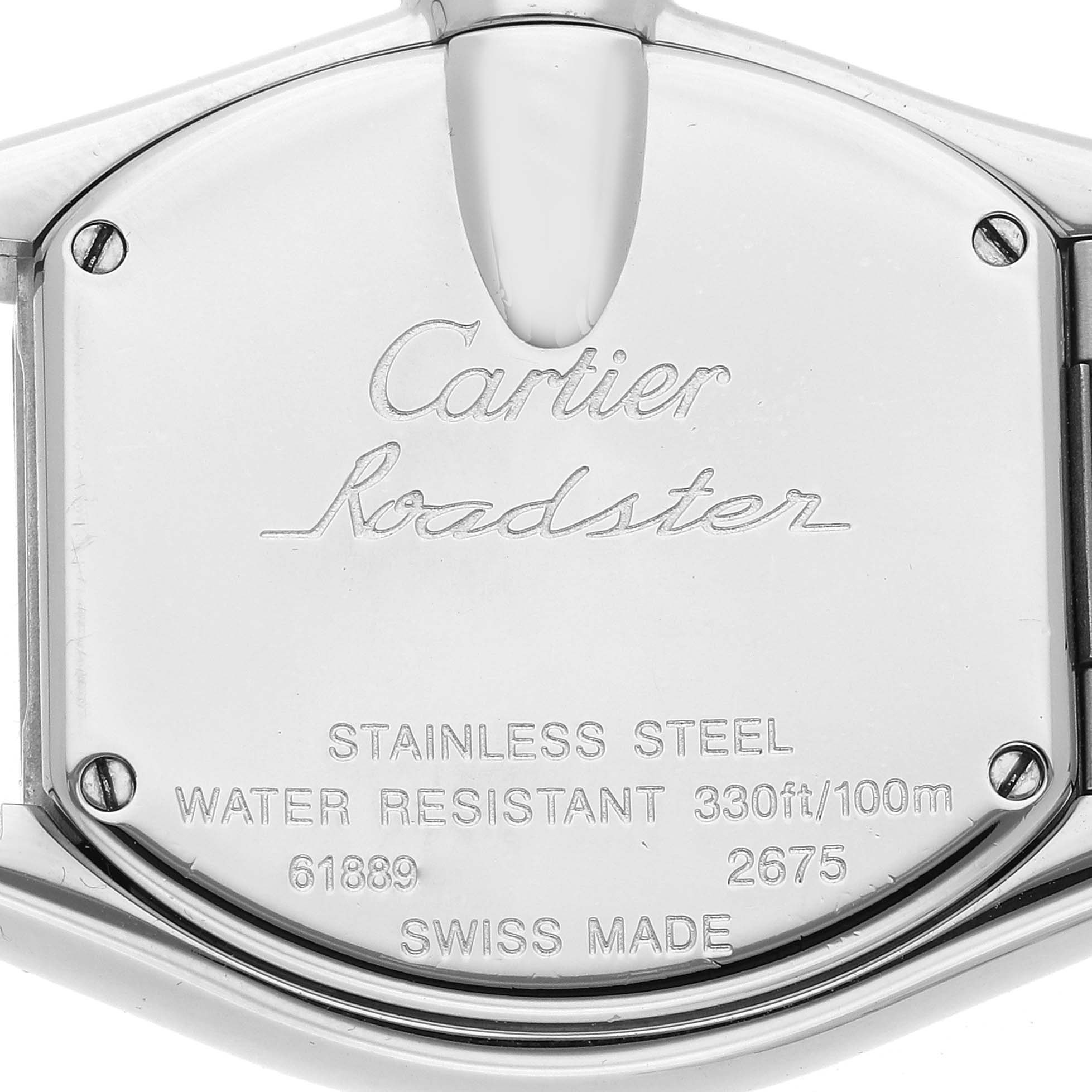 The image shows the back case of a Cartier Roadster W62026Y4 Women
s Steel and Gold (two tone) Silver Dial watch, displaying engraved details like material, water resistance, and model number.