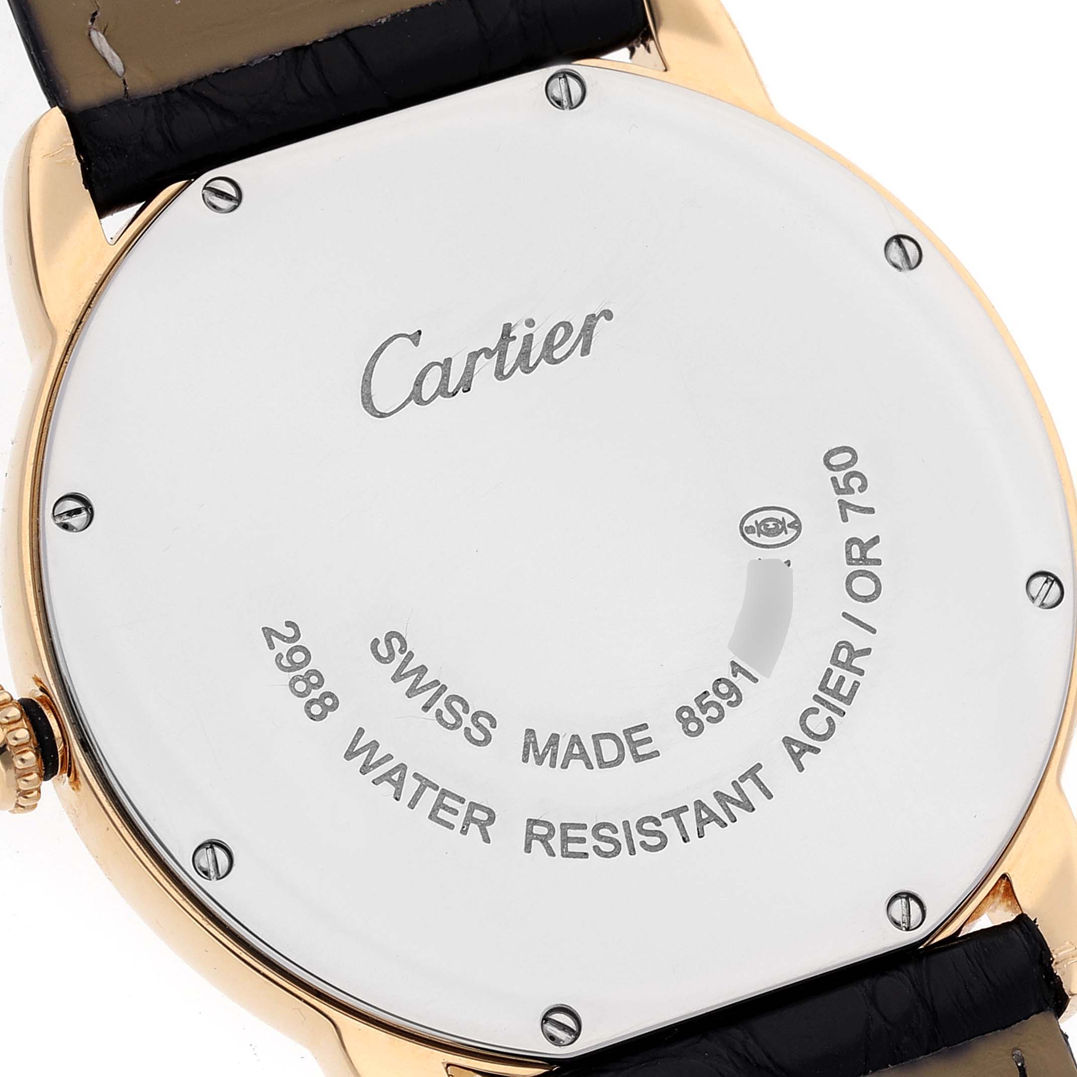 The image shows the back case of a Cartier Ronde W6700455 Men's Steel and Gold (two tone) Silver Dial W6700455 Men's Steel and Gold (two tone) Silver Dial watch, highlighting its engraved details and leather strap attachments.