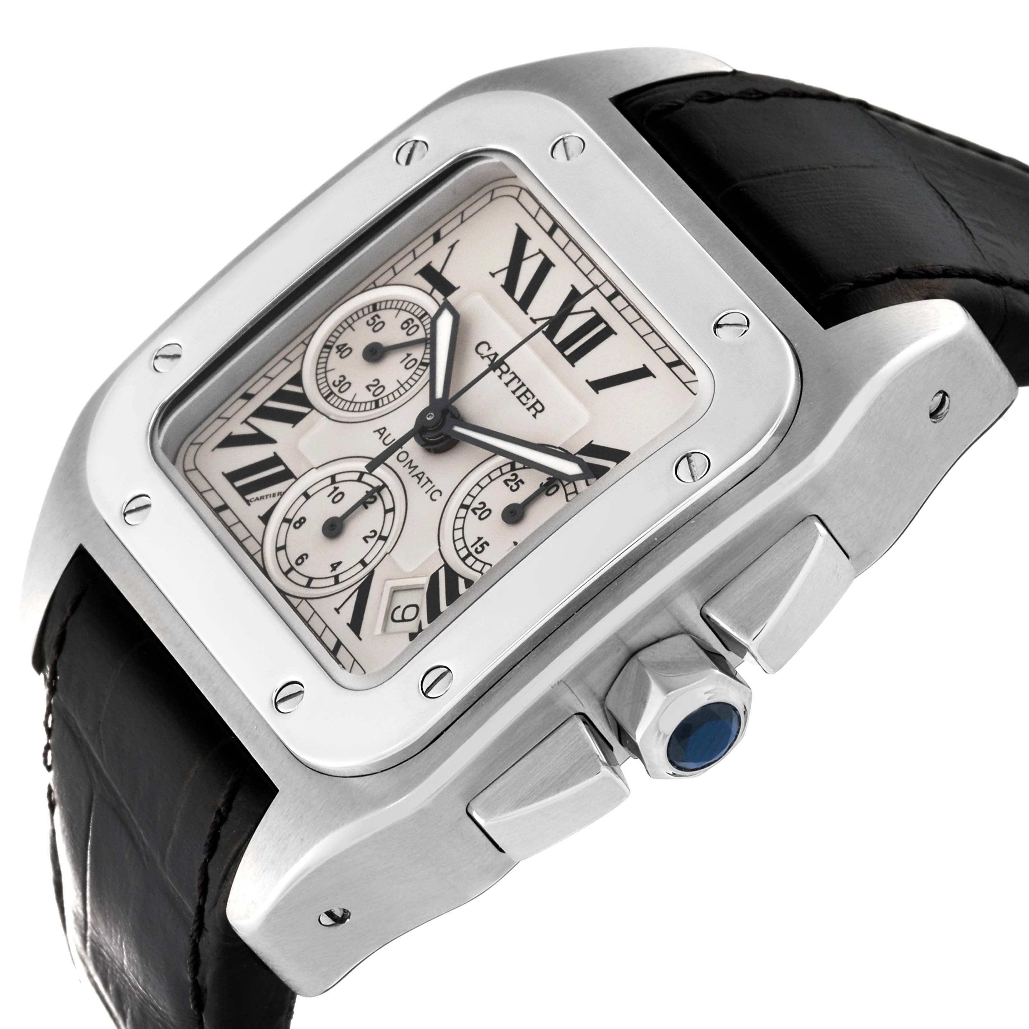 The Cartier Santos W20090X8 Men
s Stainless Steel Silver Dial W20090X8 Men
s Stainless Steel Silver Dial watch is shown at an angle highlighting its dial, bezel, crown, and black leather strap.