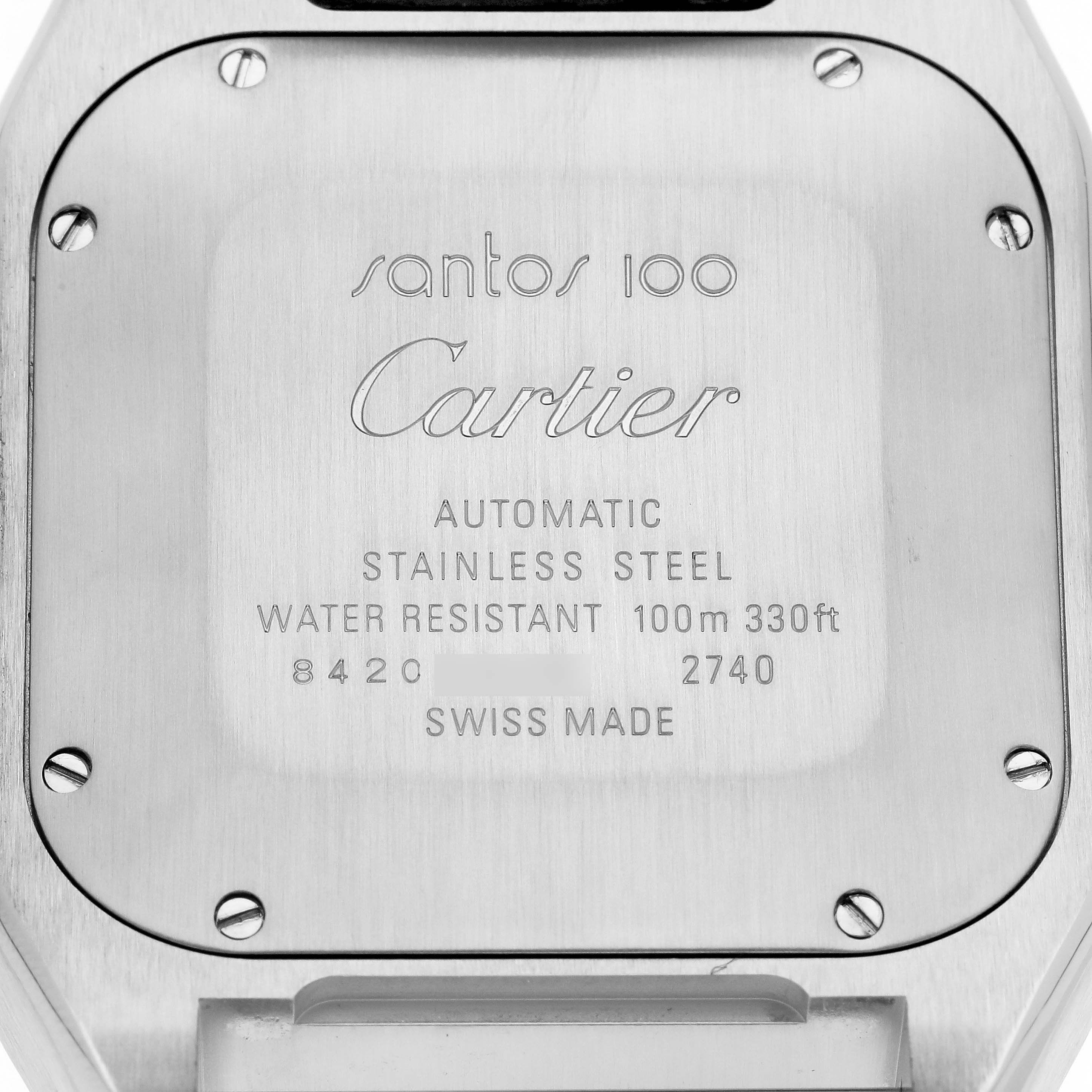 The image shows the back case of a Cartier Santos W20090X8 Men
s Stainless Steel Silver Dial W20090X8 Men
s Stainless Steel Silver Dial 100 watch, highlighting the engraved details and surrounding screws.