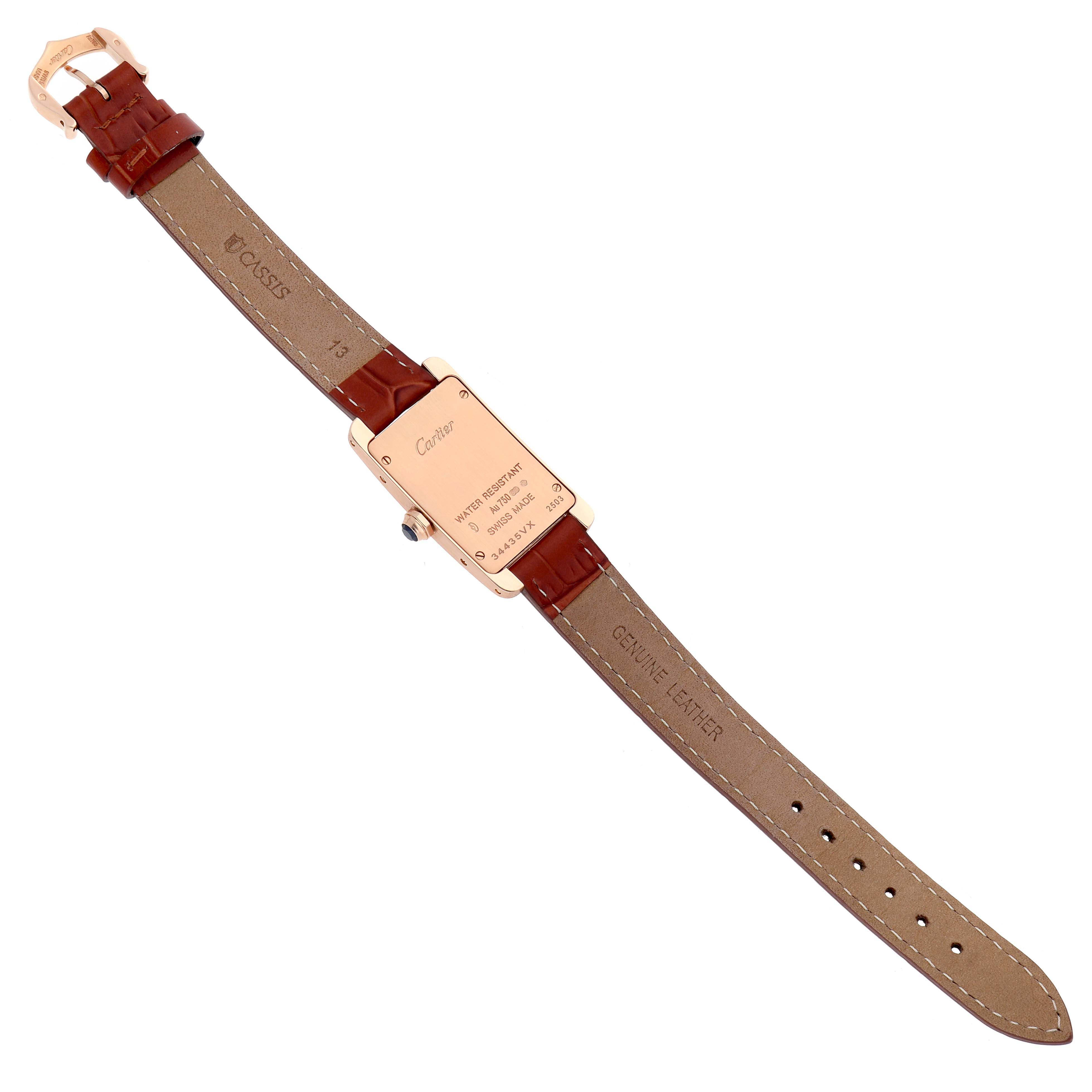 The image shows the back view of a Cartier Tank Americaine W2607456 Women's Rose Gold Silver Dial watch, displaying the case back, strap, and buckle.