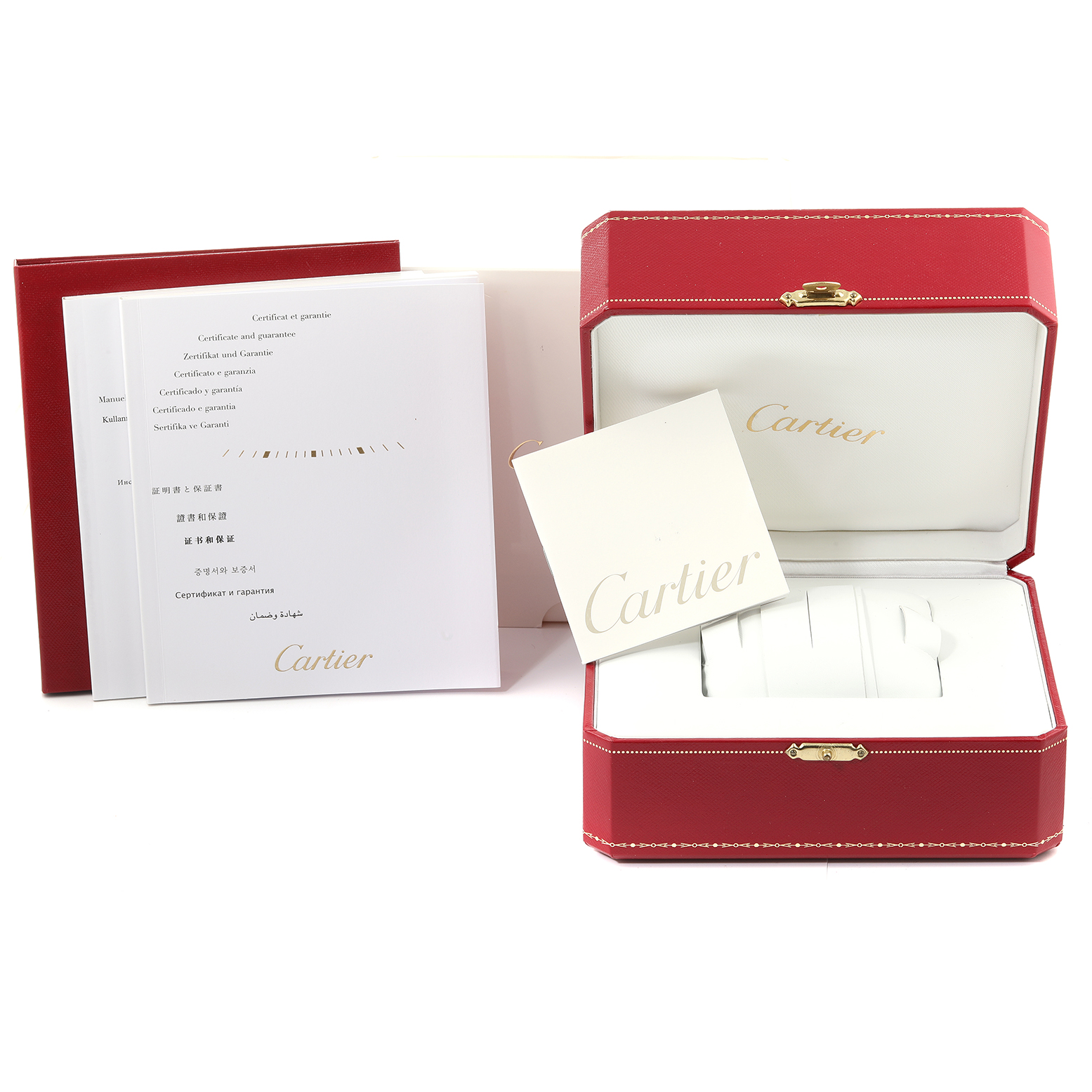 This image shows the packaging and documentation for the Cartier Tank Anglaise W5310022 Women
s Stainless Steel Silver Dial W5310022 Women
s Stainless Steel Silver Dial watch, including the box, manuals, and guarantee booklet.