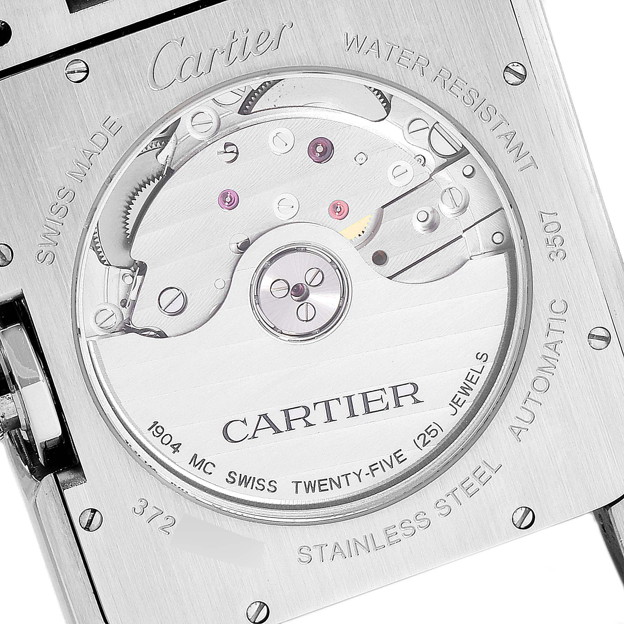This image shows the back case and exposed movement of a Cartier Tank Anglaise W5310008 Men's Stainless Steel Silver Dial W5310008 Men's Stainless Steel Silver Dial watch, displaying its inner mechanisms and engravings.