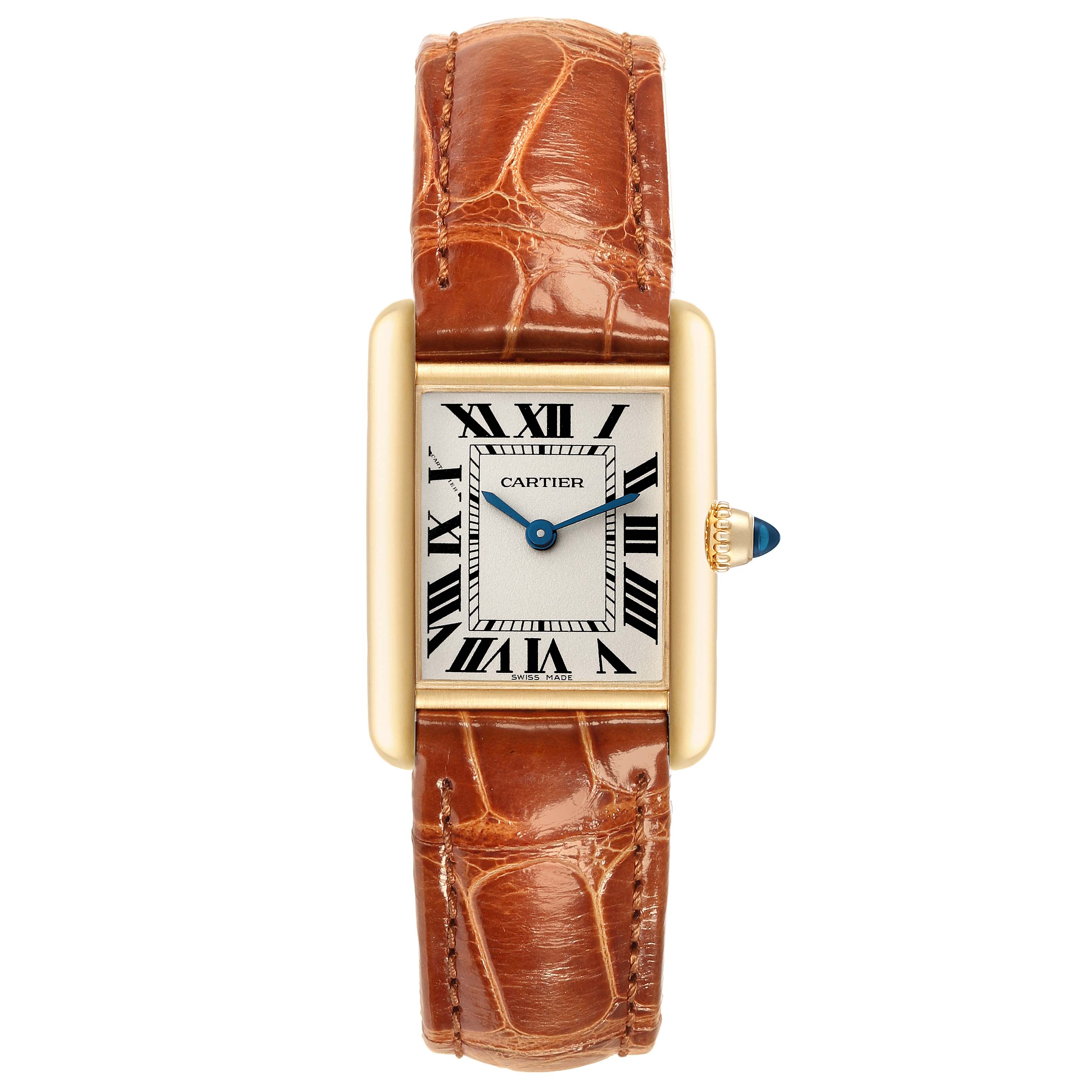 This image shows a Cartier Tank Louis W1529856 Women's Yellow Gold Silver Dial W1529856 Women's Yellow Gold Silver Dial watch from a top-down angle, highlighting its face, crown, and brown leather strap.