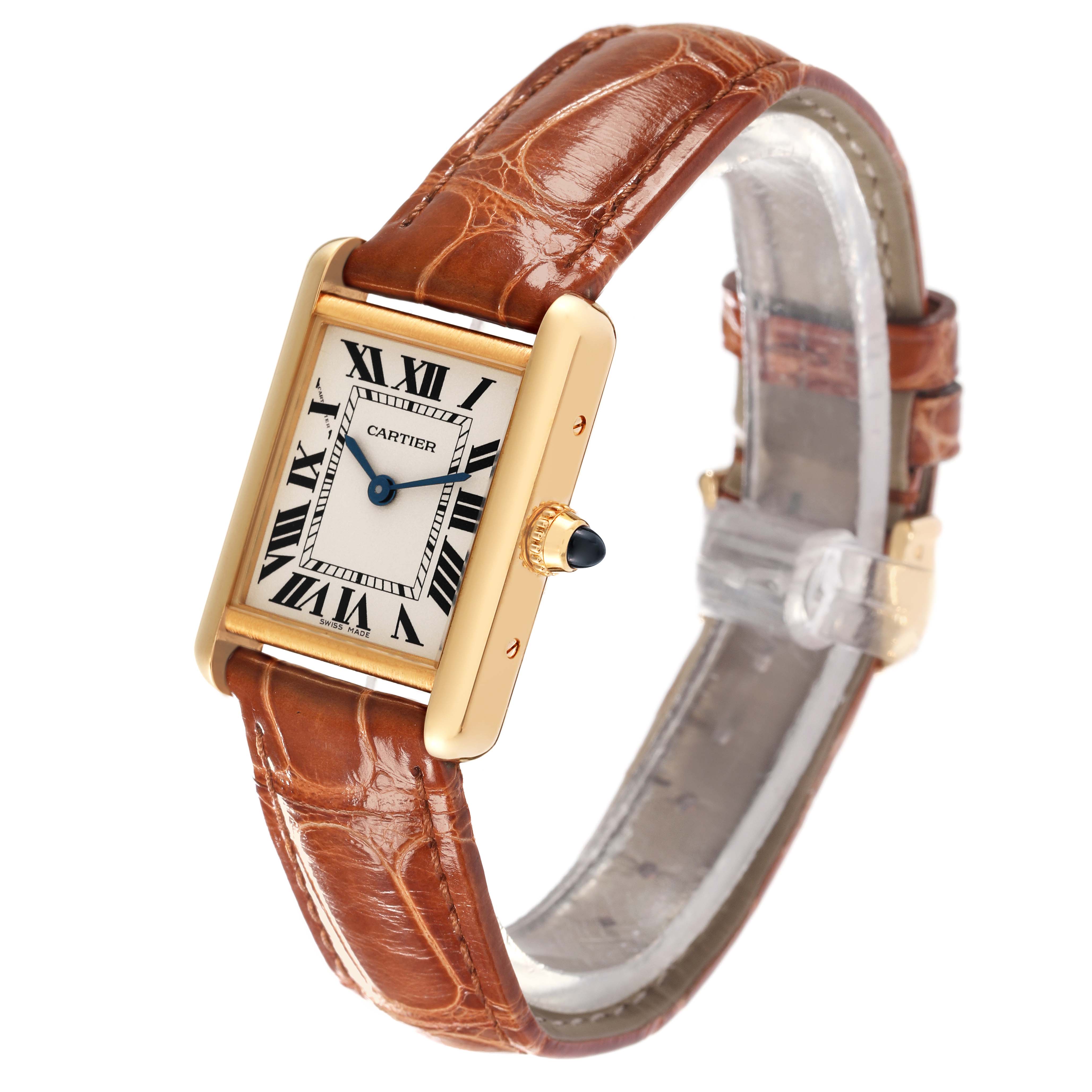 The image shows a Cartier Tank Louis W1529856 Women's Yellow Gold Silver Dial W1529856 Women's Yellow Gold Silver Dial watch with a brown leather strap and a rectangular gold face, angled slightly from the left.