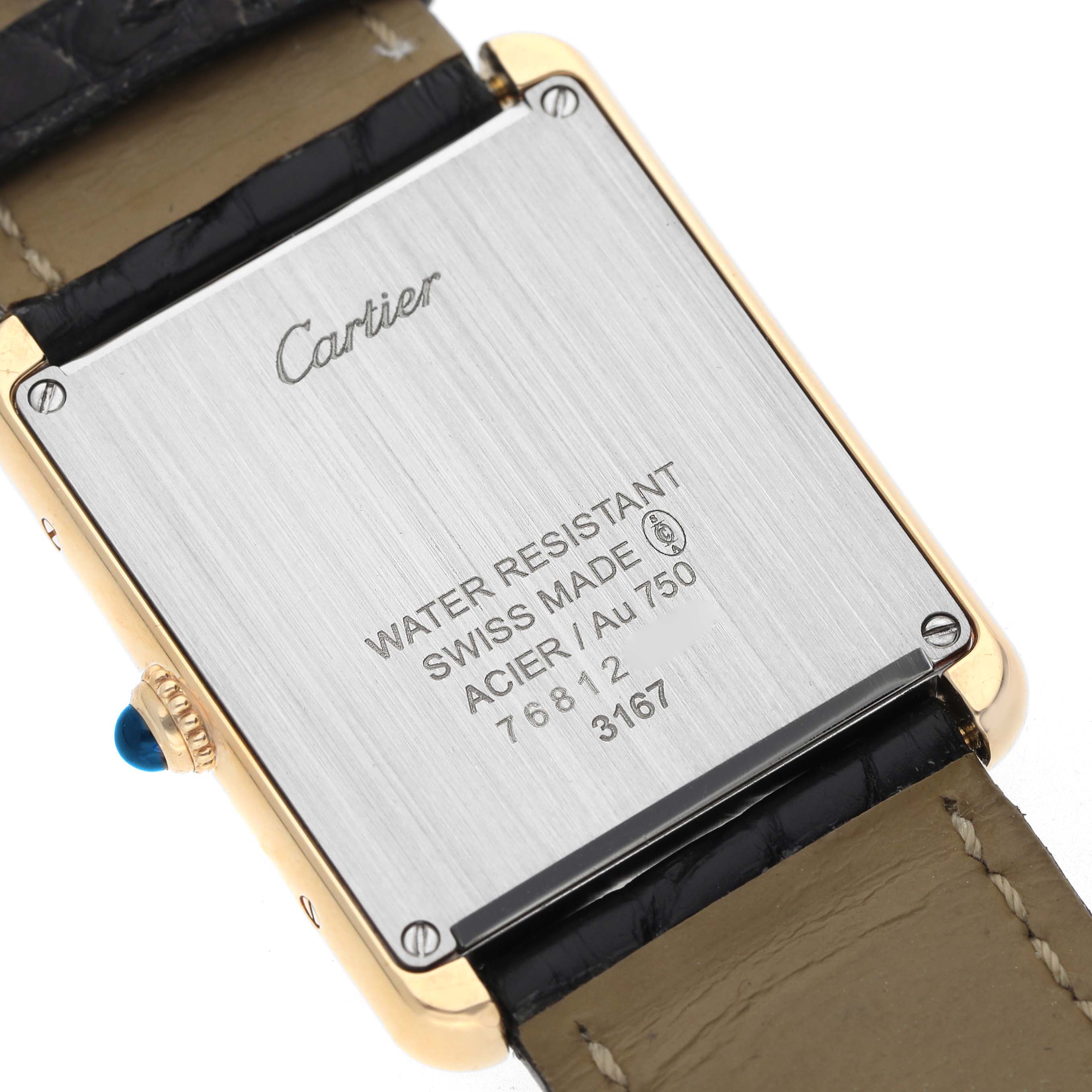 The image shows the back of a Cartier Tank Solo W5200004 Men
s Steel and Gold (two tone) Silver Dial watch, featuring markings and part of the strap.