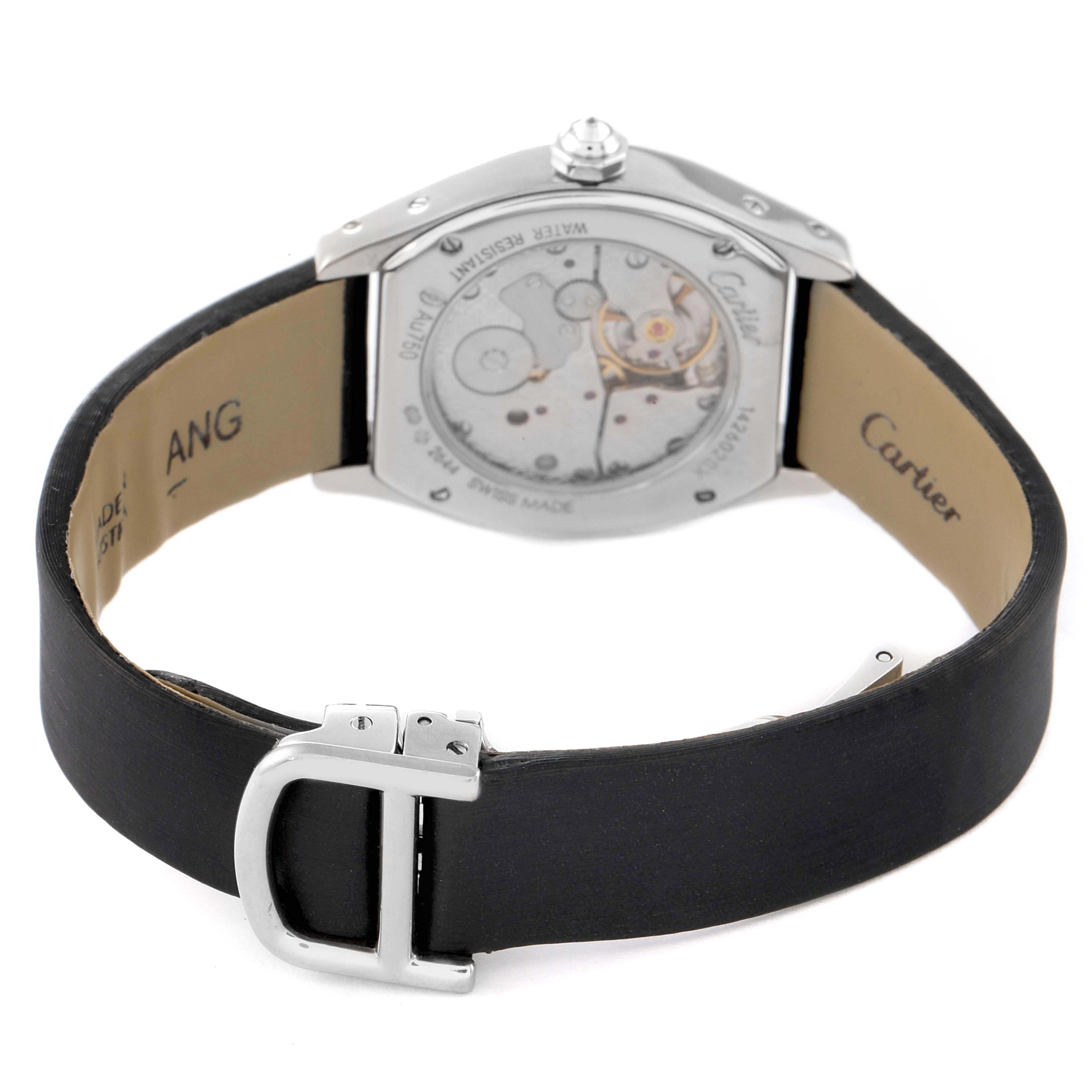 The image shows the back of the Cartier Tortue WA507231 Women's White Gold Silver Dial watch at an angle, highlighting the movement and leather strap.