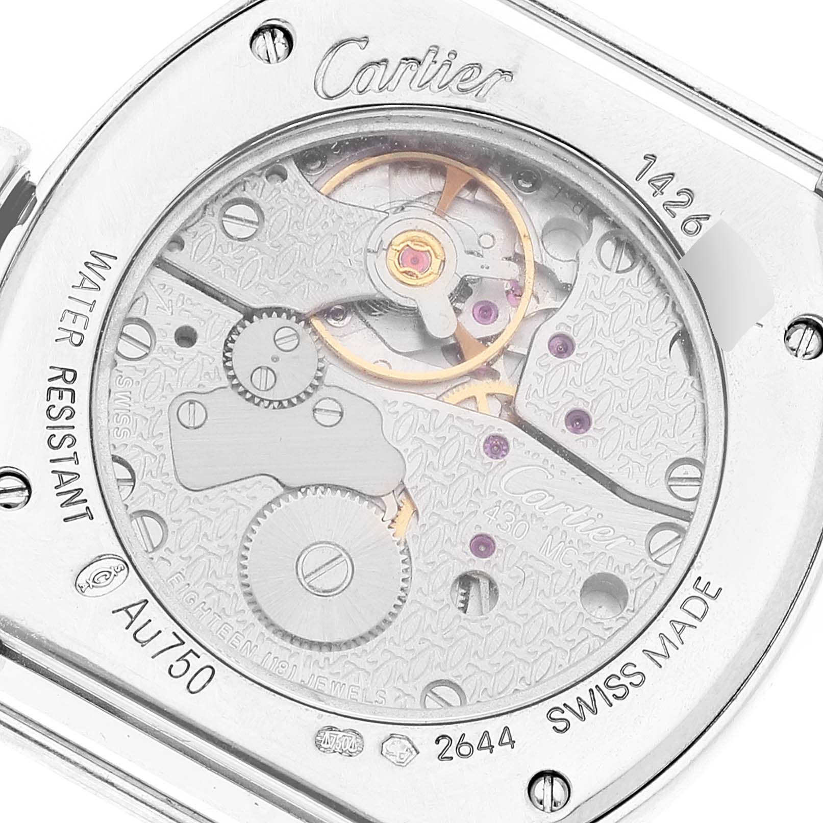 The image shows the back view of the Cartier Tortue WA507231 Women's White Gold Silver Dial WA507231 Women's White Gold Silver Dial watch, highlighting its movement and intricate mechanics.