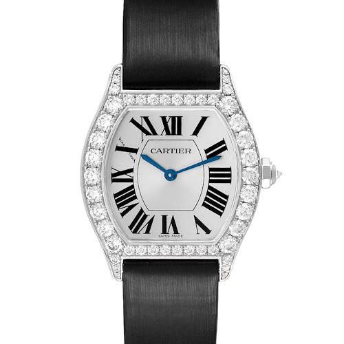 The Cartier Tortue WA507231 Women's White Gold Silver Dial watch is shown from the front, displaying its diamond-set bezel, Roman numeral dial, and black strap.