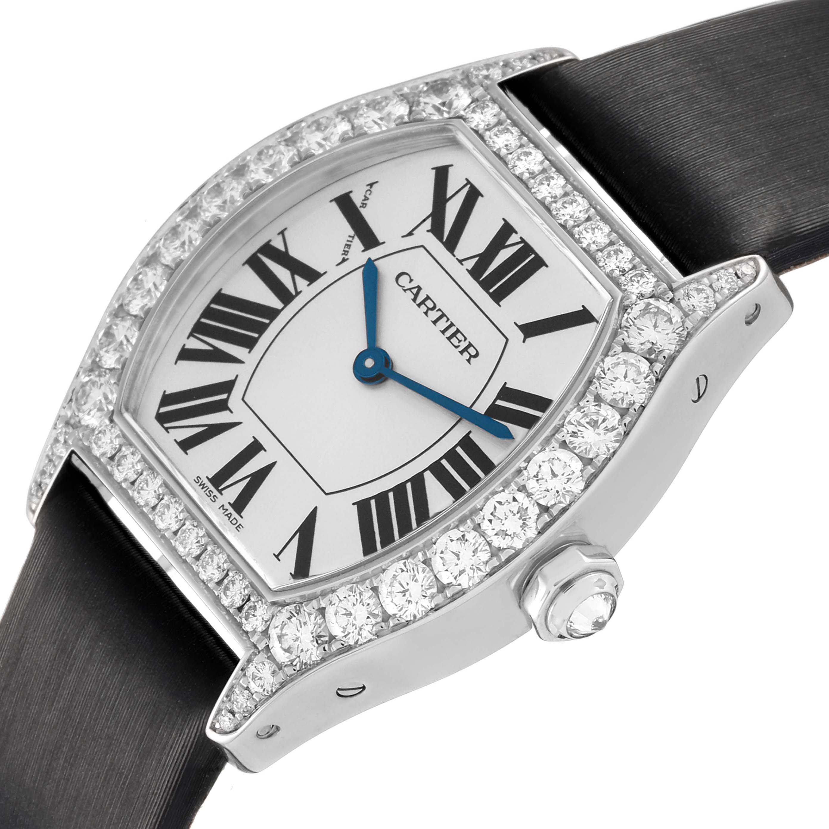 The Cartier Tortue WA507231 Women's White Gold Silver Dial watch is shown from a side angle highlighting its face, diamond bezel, crown, and strap.