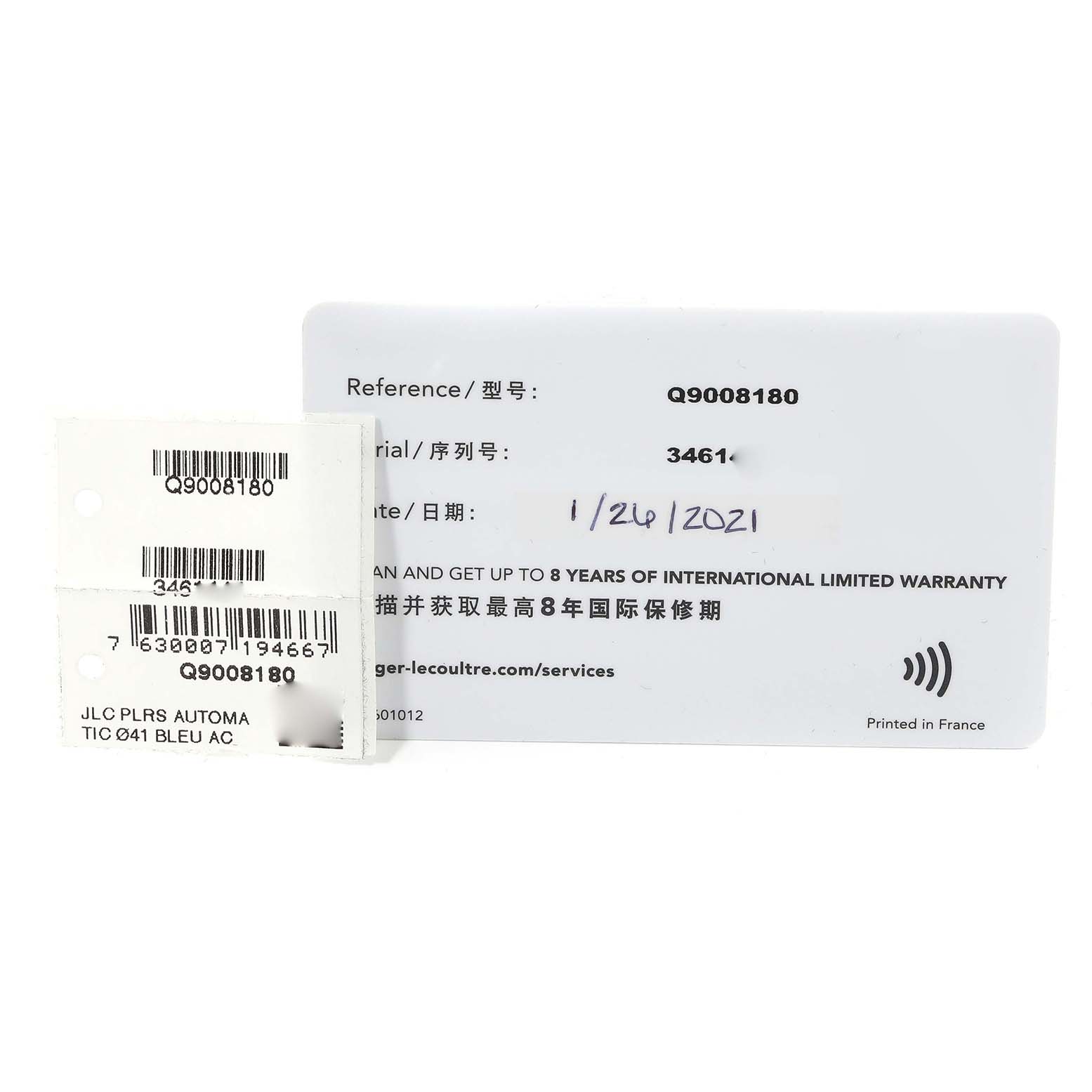 The image shows warranty cards and tags for a Jaeger LeCoultre Polaris Q9008180 Men's Stainless Steel Blue Dial Q9008180 Men's Stainless Steel Blue Dial model watch.