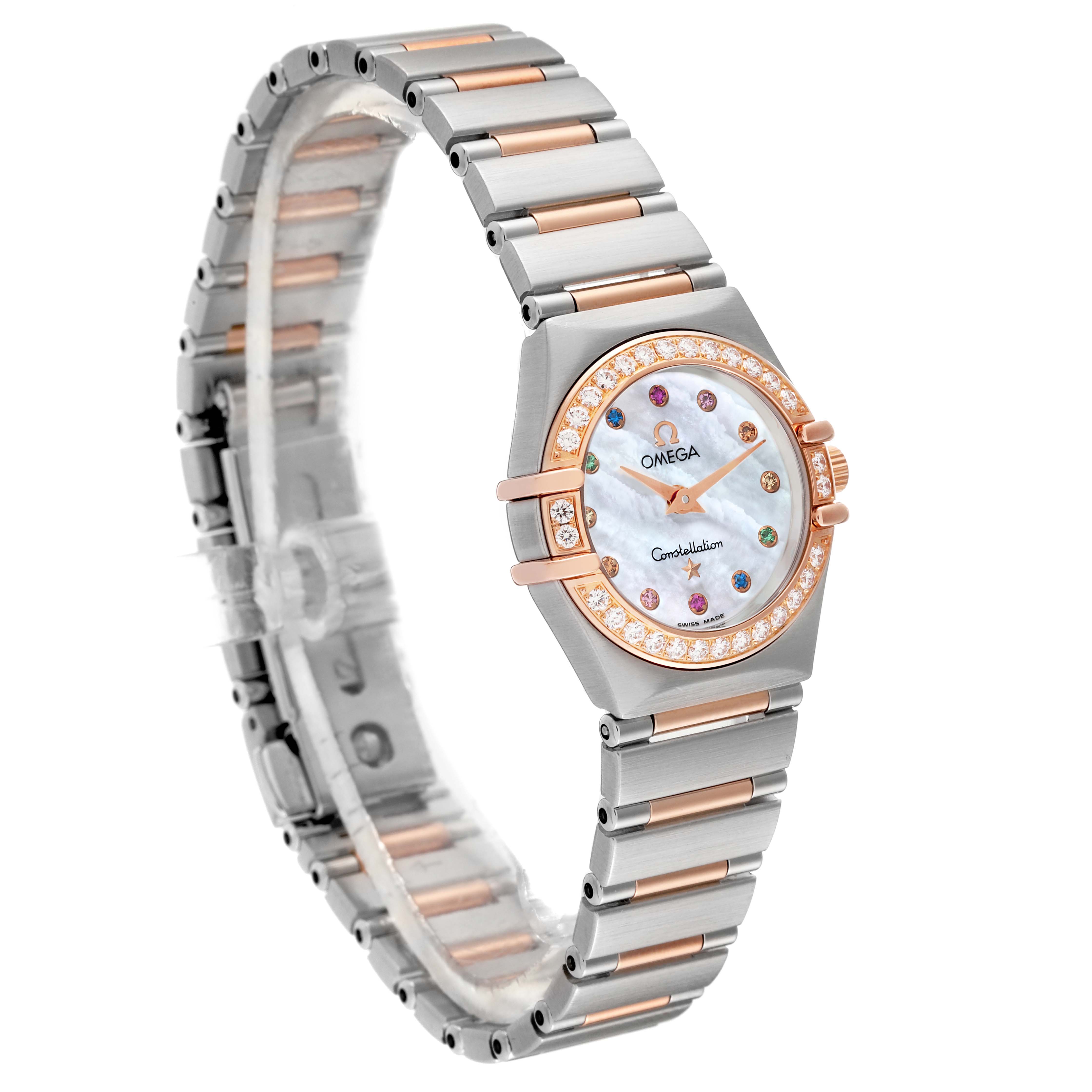 The Omega 1360.79.00 Women's Steel and Gold (two tone) Mother of Pearl Dial 1360.79.00 Women's Steel and Gold (two tone) Mother of Pearl Dial Constellation Steel Rose Gold MOP Diamond Ladies Watch 1360.79.00 is shown at an angled side view, highlighting its bracelet and diamond-studded bezel.