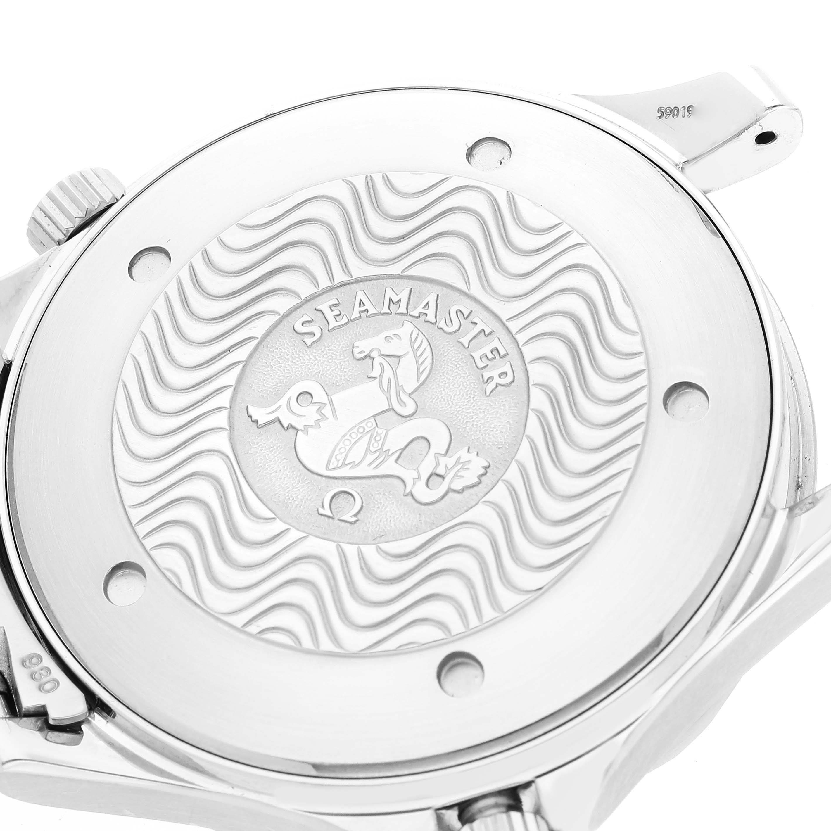 The image shows the back case of an Omega Seamaster 2264.50.00 Men's Stainless Steel Black Dial 2264.50.00 Men's Stainless Steel Black Dial watch, highlighting the engraved logo and wavy pattern.