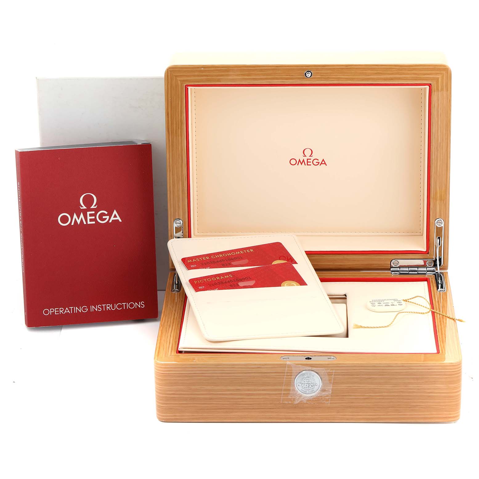 This image shows the Omega Seamaster 210.30.44.51.06.001 Men's Stainless Steel Grey Dial 210.30.44.51.06.001 Men's Stainless Steel Grey Dial's wooden presentation box, operating instructions, and certification cards.