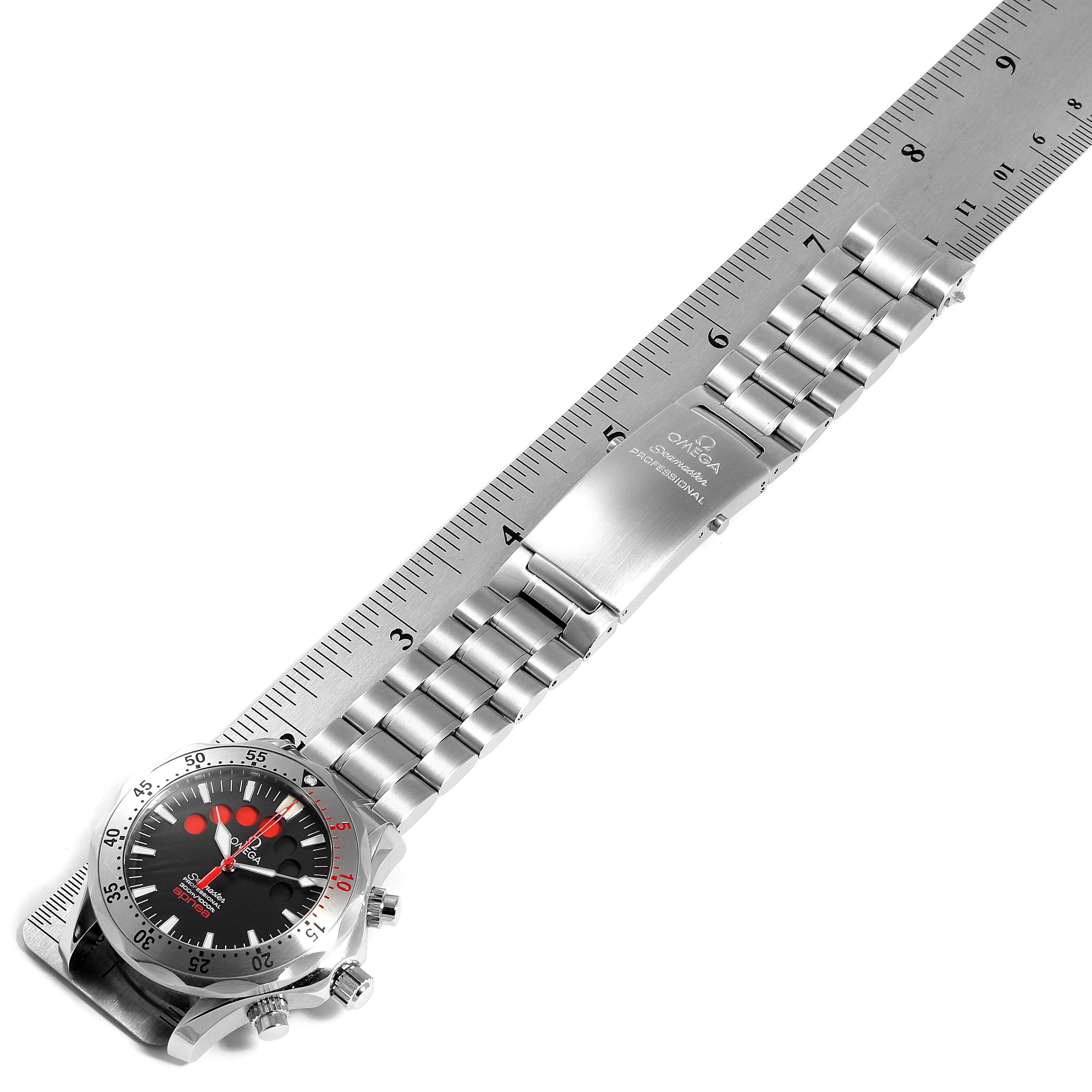 The image shows a side angle of an Omega Seamaster 2595.50.00 Men's Stainless Steel Black Dial 2595.50.00 Men's Stainless Steel Black Dial watch, highlighting the bracelet, clasp, and face with a ruler for scale.