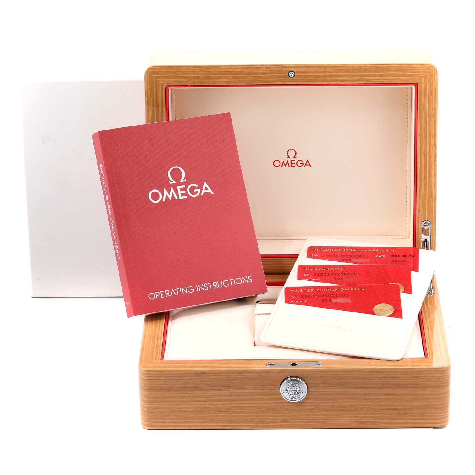 The image shows the packaging and accessories of an Omega Seamaster 210.32.42.20.01.001 Men's Stainless Steel Black Dial 210.32.42.20.01.001 Men's Stainless Steel Black Dial, including the instruction manual and warranty cards.