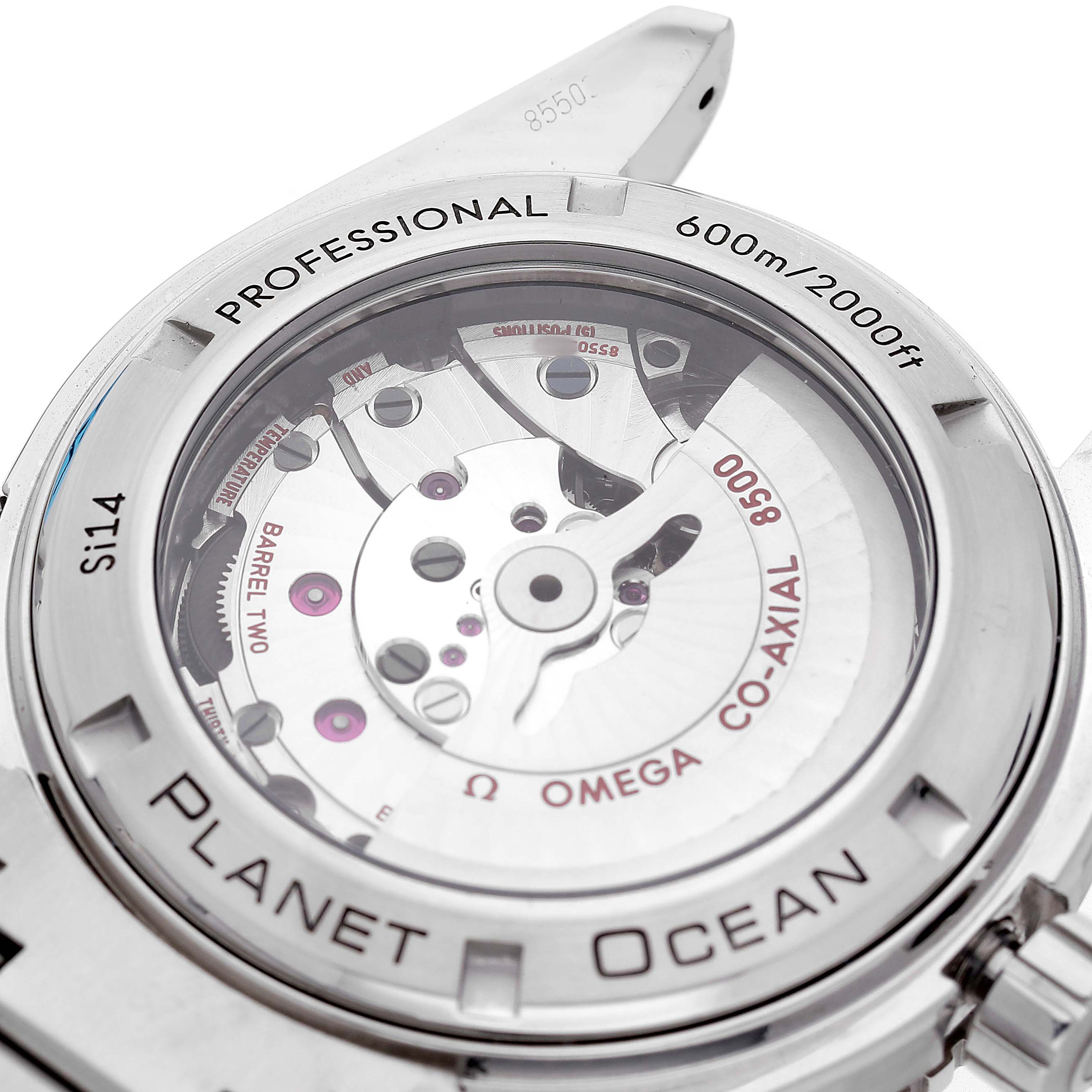 The image shows the back of the Omega Planet Ocean 232.30.46.21.01.001 Men's Stainless Steel Black Dial watch, highlighting its mechanical movement through a transparent case back.